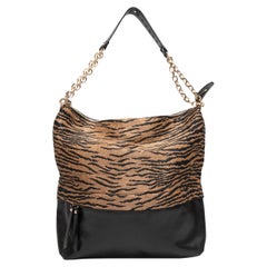 Bolso Hobo Christian Louboutin de Piel y Rafia Negro y Beige