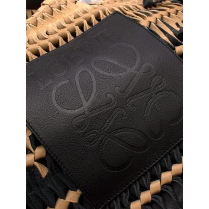 Bolso tote Anagrama de ante negro y beige con flecos en venta 1