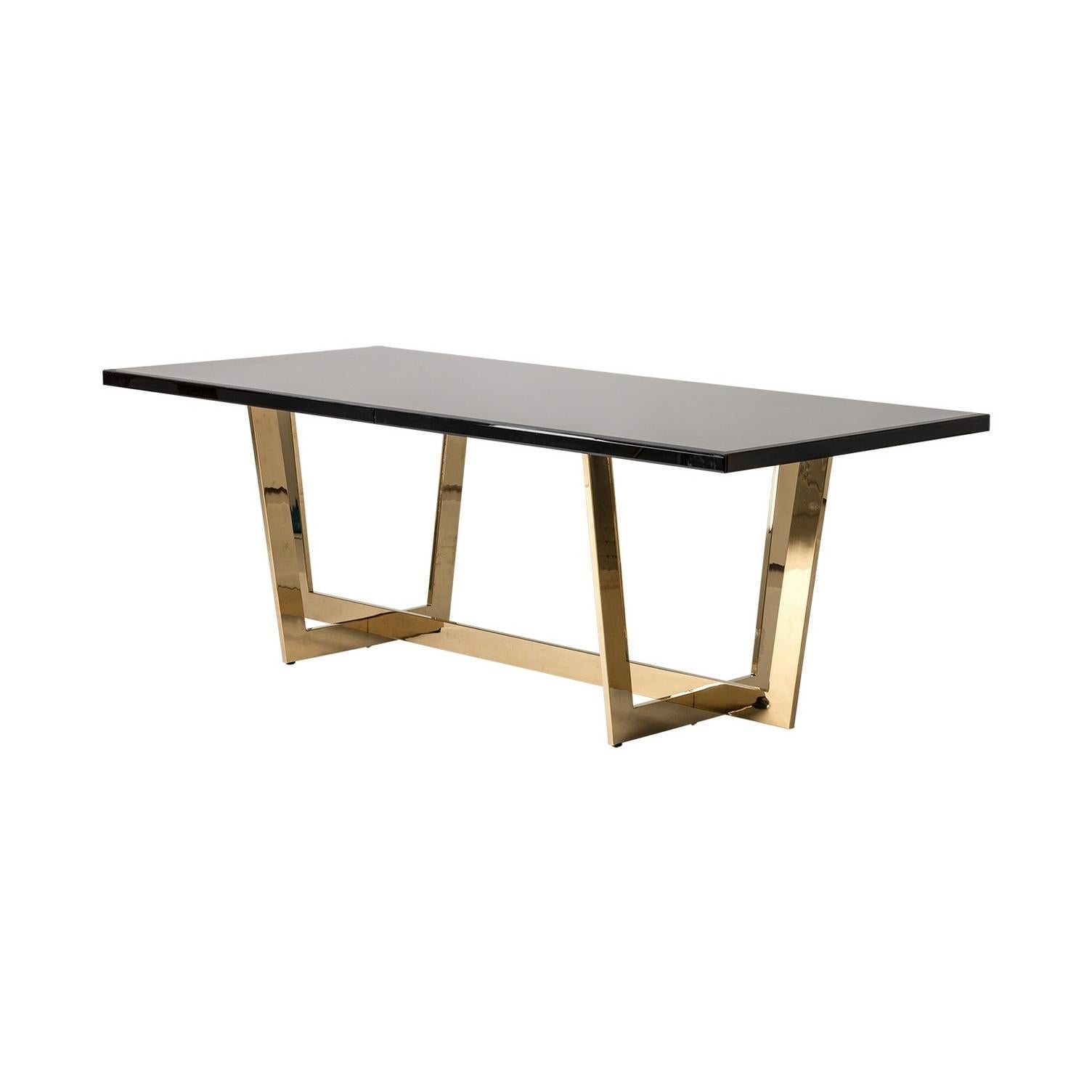 Black bevelled glass top and gilded metal graphic base rectangular dining table.
