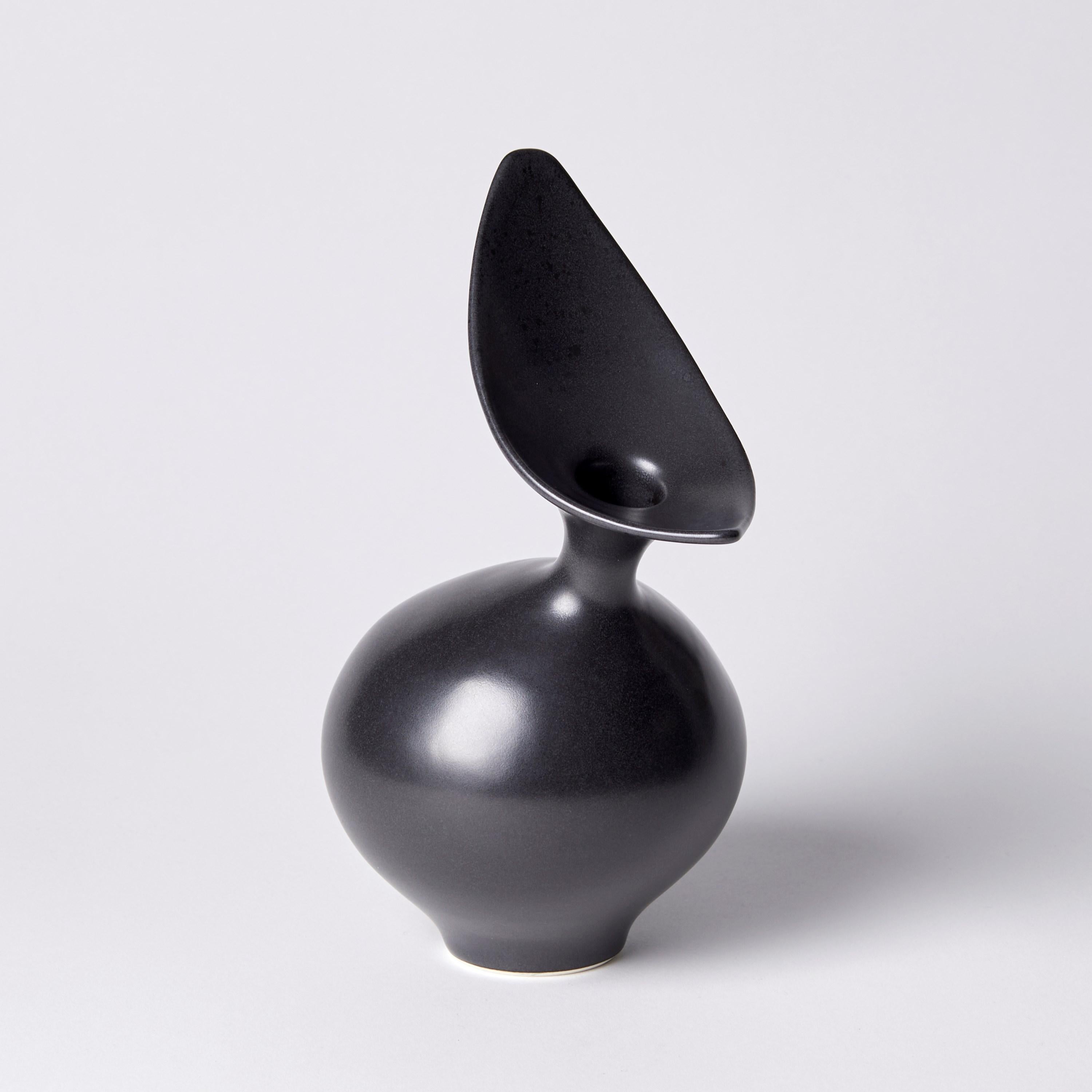 ‘Black Bird’ is a unique porcelain sculptural vessel by the British artist, Vivienne Foley. 

Vivienne Foley is based in Gloucestershire where she produces exquisite ceramic sculpture. Although in essence they are often functional pieces in form,