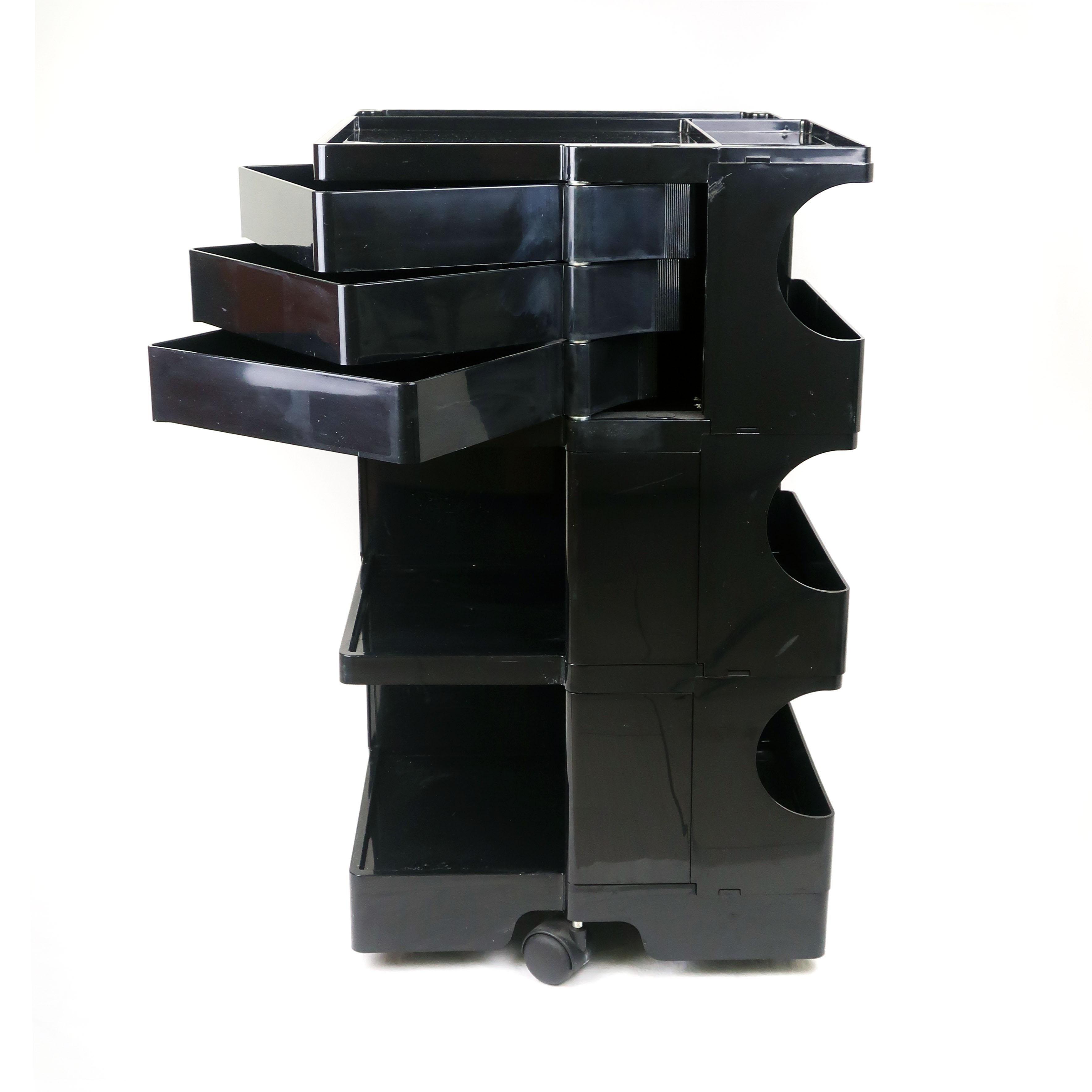 Joe Colombo’s iconic Boby trolley storage unit is at much at home in an artist’s studio as in a home office. First released in 1970 and included in the permanent collection of both the MoMA and the “Triennale” in Milan, this black plastic cart rolls