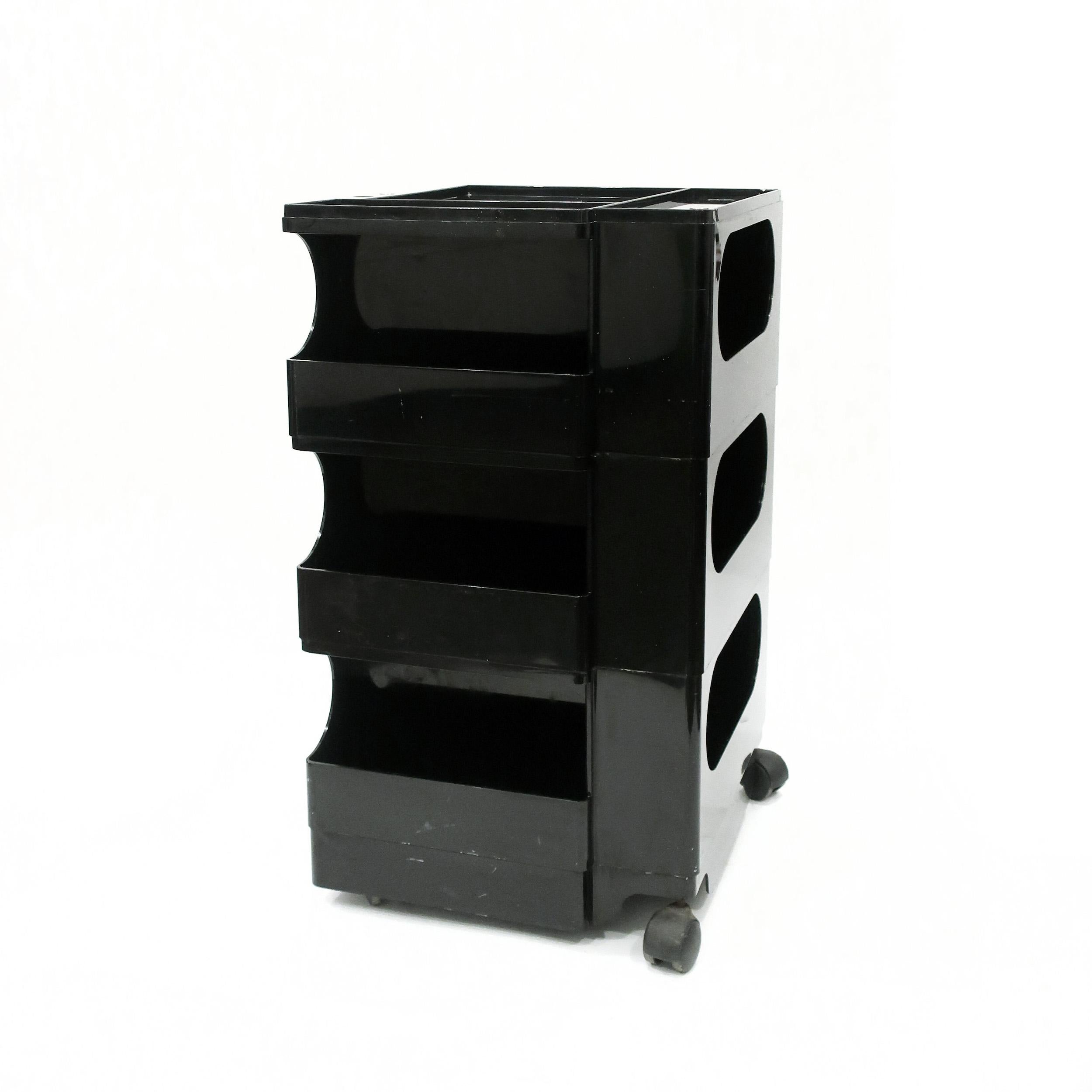 Joe Colombo’s iconic Boby trolley storage unit is at much at home in an artist’s studio as in a home office. First released in 1970 and included in the permanent collection of both the MoMA and the “Triennale” in Milan, this black plastic cart rolls
