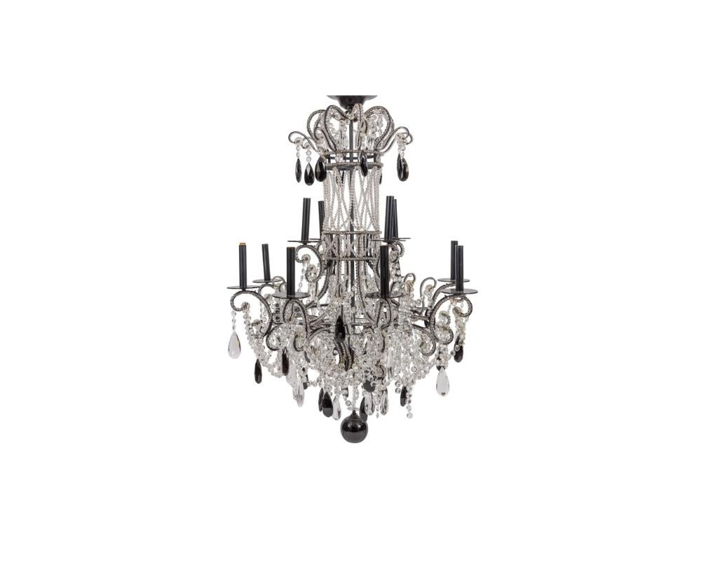 Black Bohemian Crystals Glass Twelve Light Two Tier Chandelier
this is from the 1980's in great condition
with black and clear bohemian crystals.
DIMENSIONS:
Height: 50.00