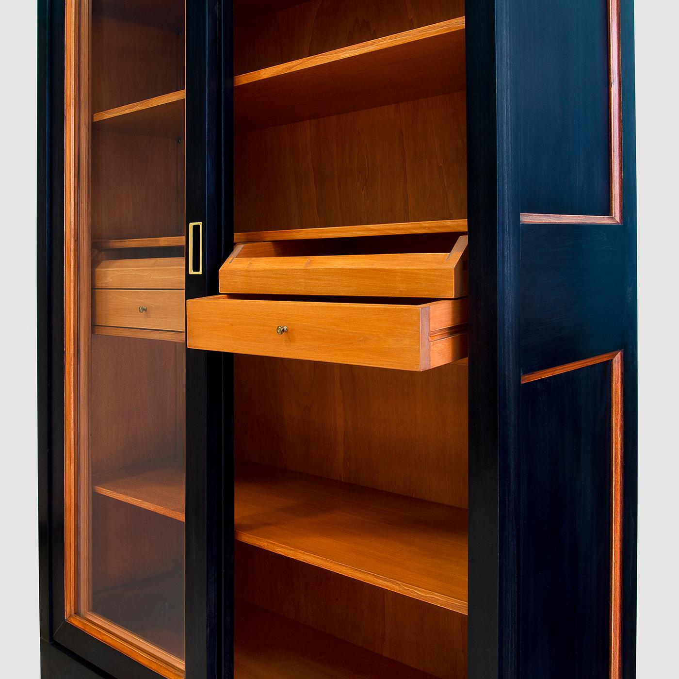 black bookcase with glass doors