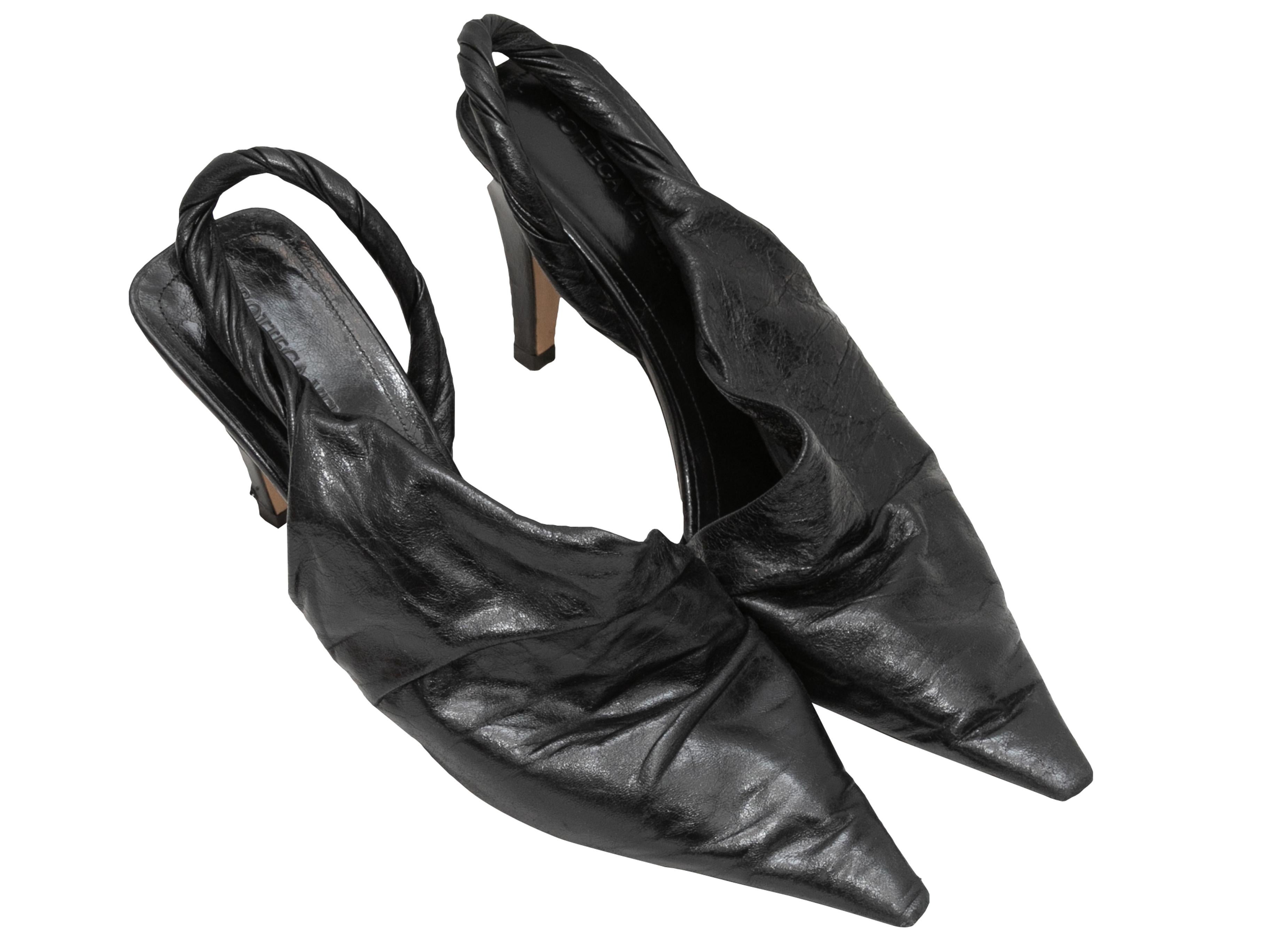 Black pointed-toe leather slingbacks by Bottega Veneta. 3.5