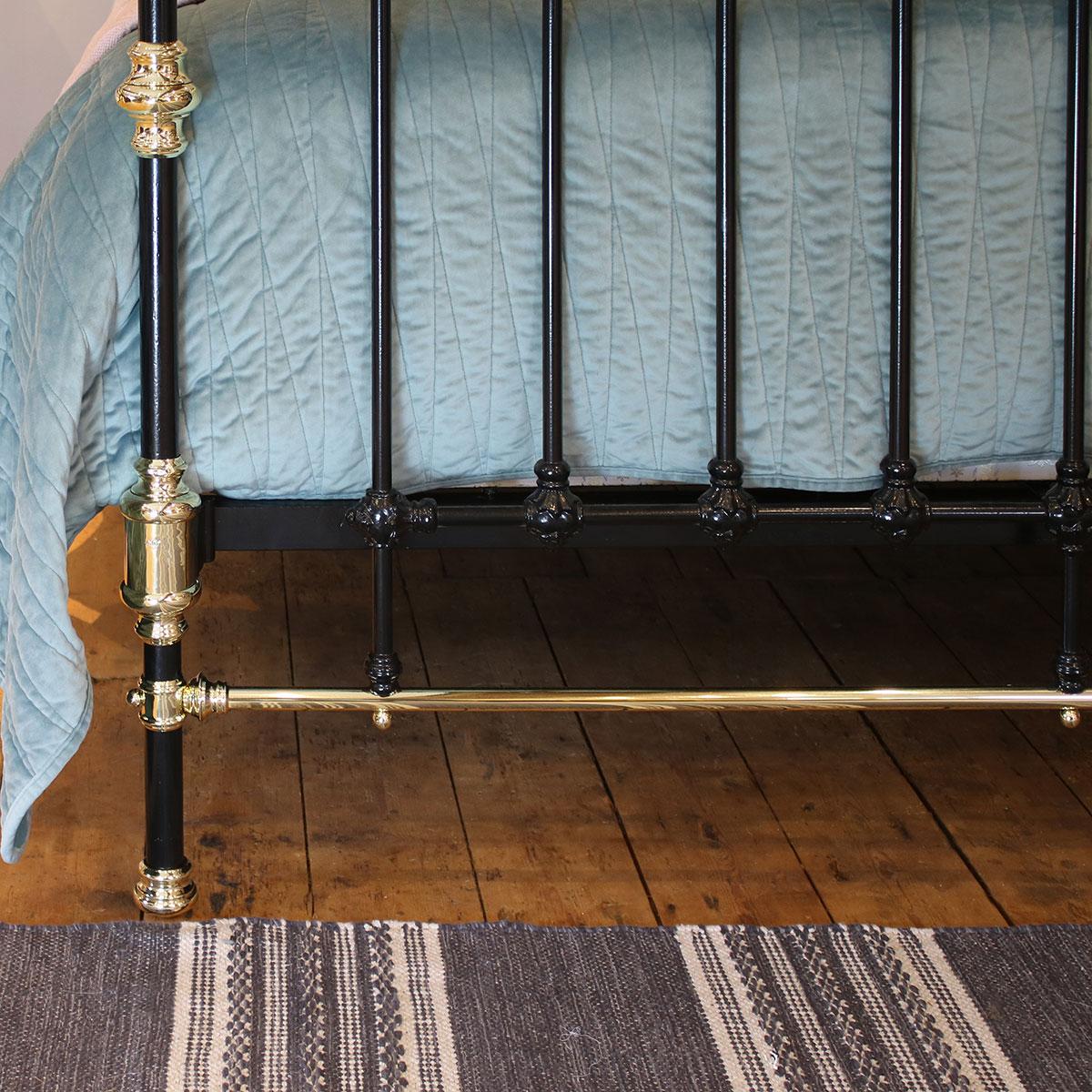 Antique bed in black with brass top rail, Classic design and brass decoration on the posts.

This bed accepts a UK King size or US Queen size (5ft, 60in or 150cm wide) base and mattress set.

The price includes a standard firm bed base to