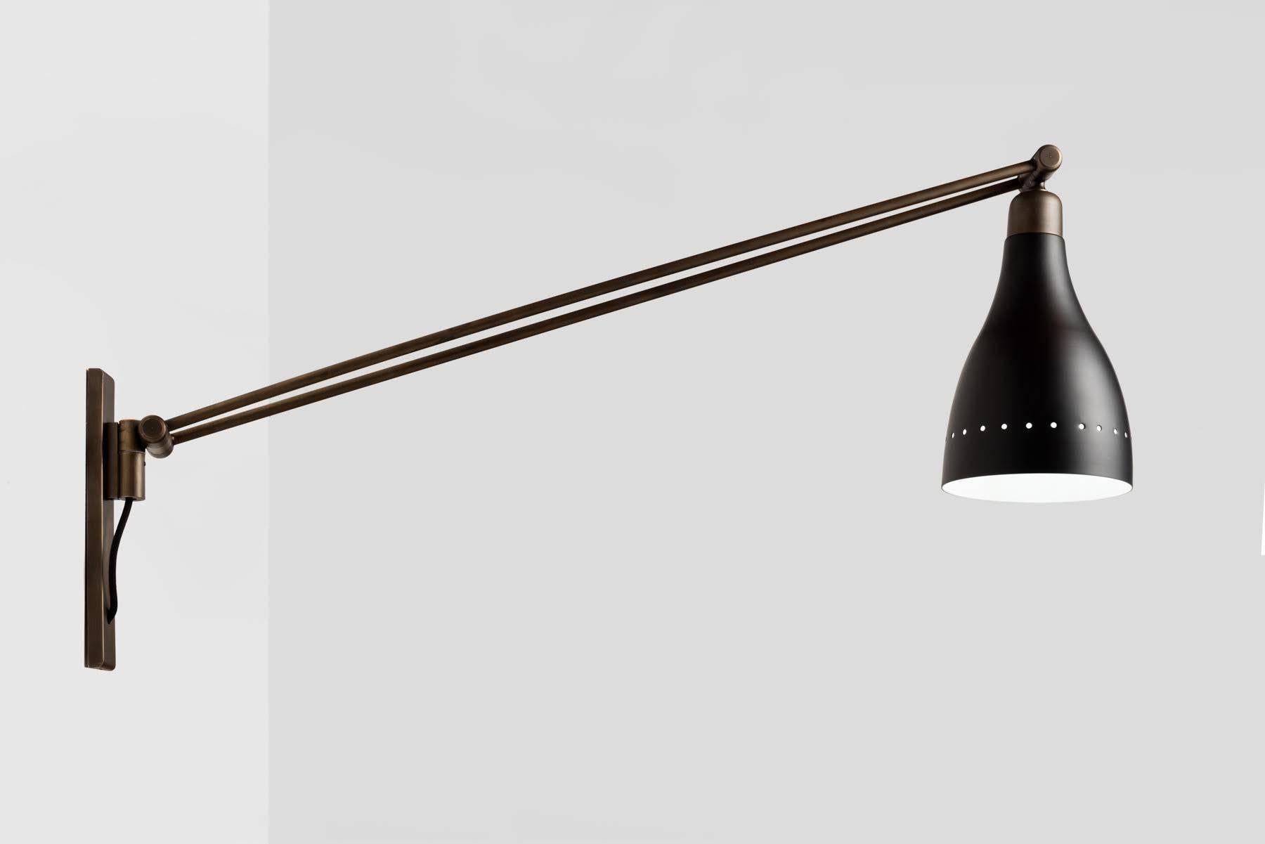 Black & Brass Modern Sconce, Italy, 21st Century

Arms rotate up and down, with additional movement at shade.

Measure: 6.5