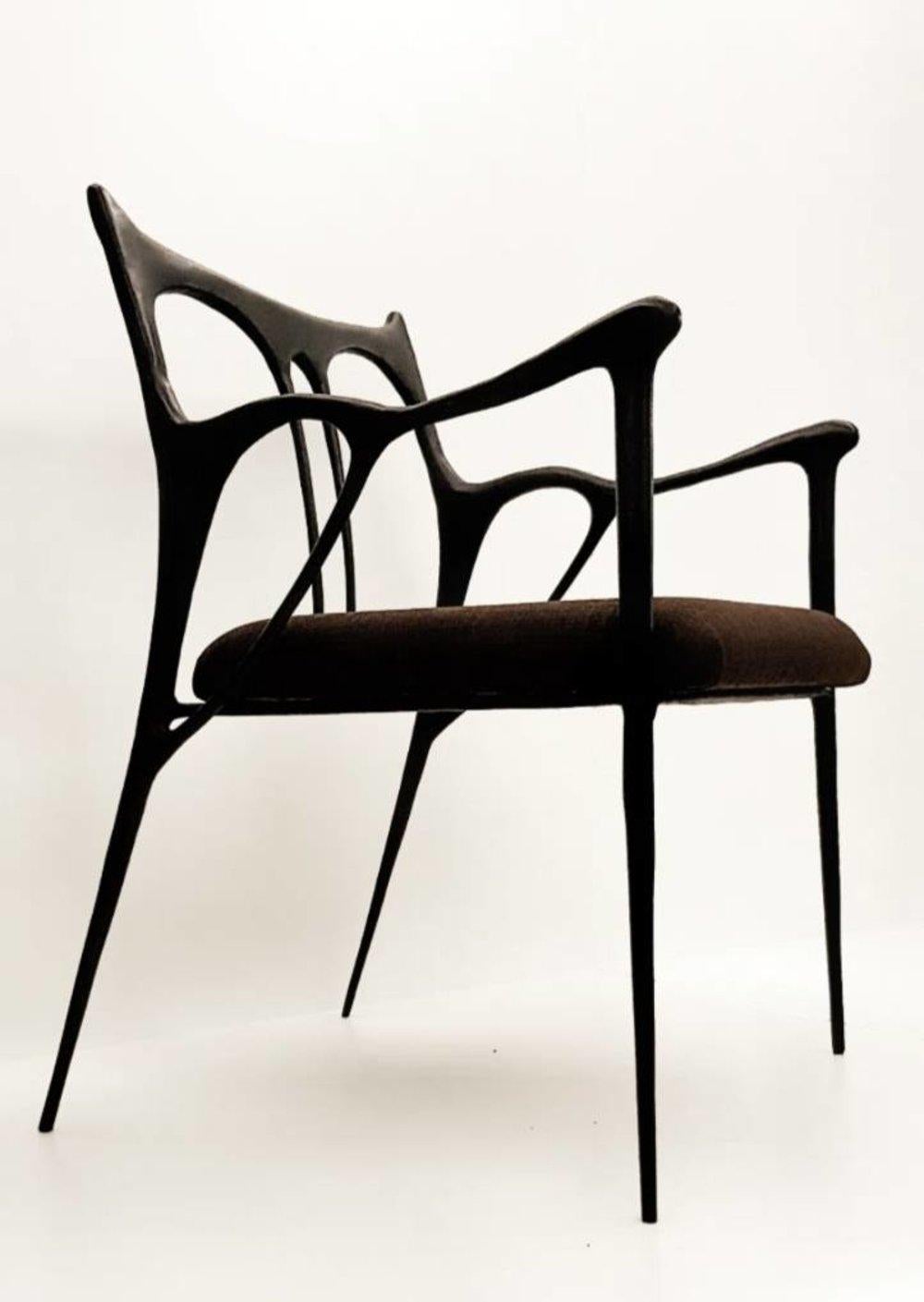 Black brass sculpted brass chair, Misaya.
Dimensions: W 54 x L 58 x H 79 cm (seating: 63)
Hand-sculpted chair in brass.

The translation of Art Nouveau’s whiplash motifs through the subtle expression of an oriental brushstroke. The sculpturally