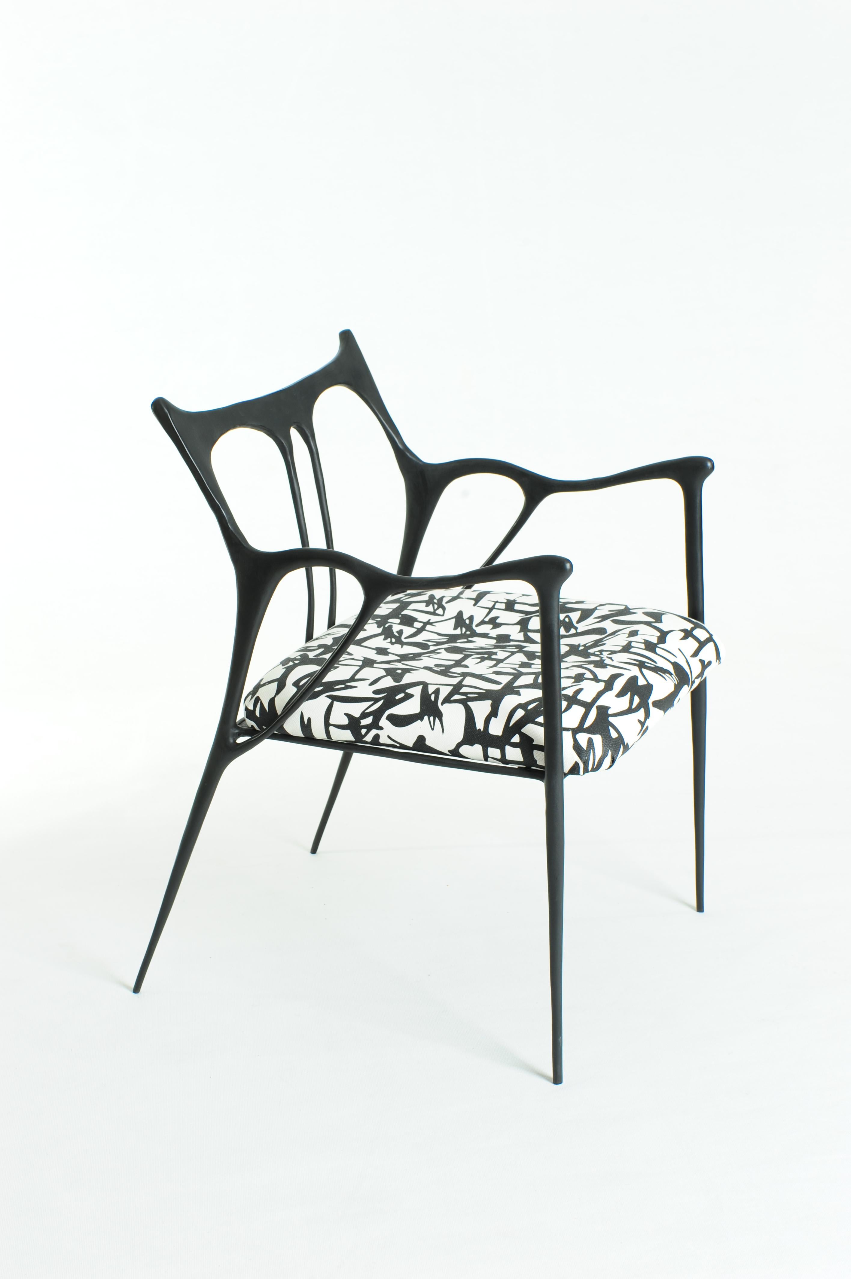 Black brass sculpted chair by Misaya
Dimensions: W 54 x L 58 x H 79 cm (seating: 63)
Hand-sculpted chair in brass.
 
Misaya emulates Chinese ink paintings through the process of lost-wax casting.

Each piece in the Ink collection – which consists of
