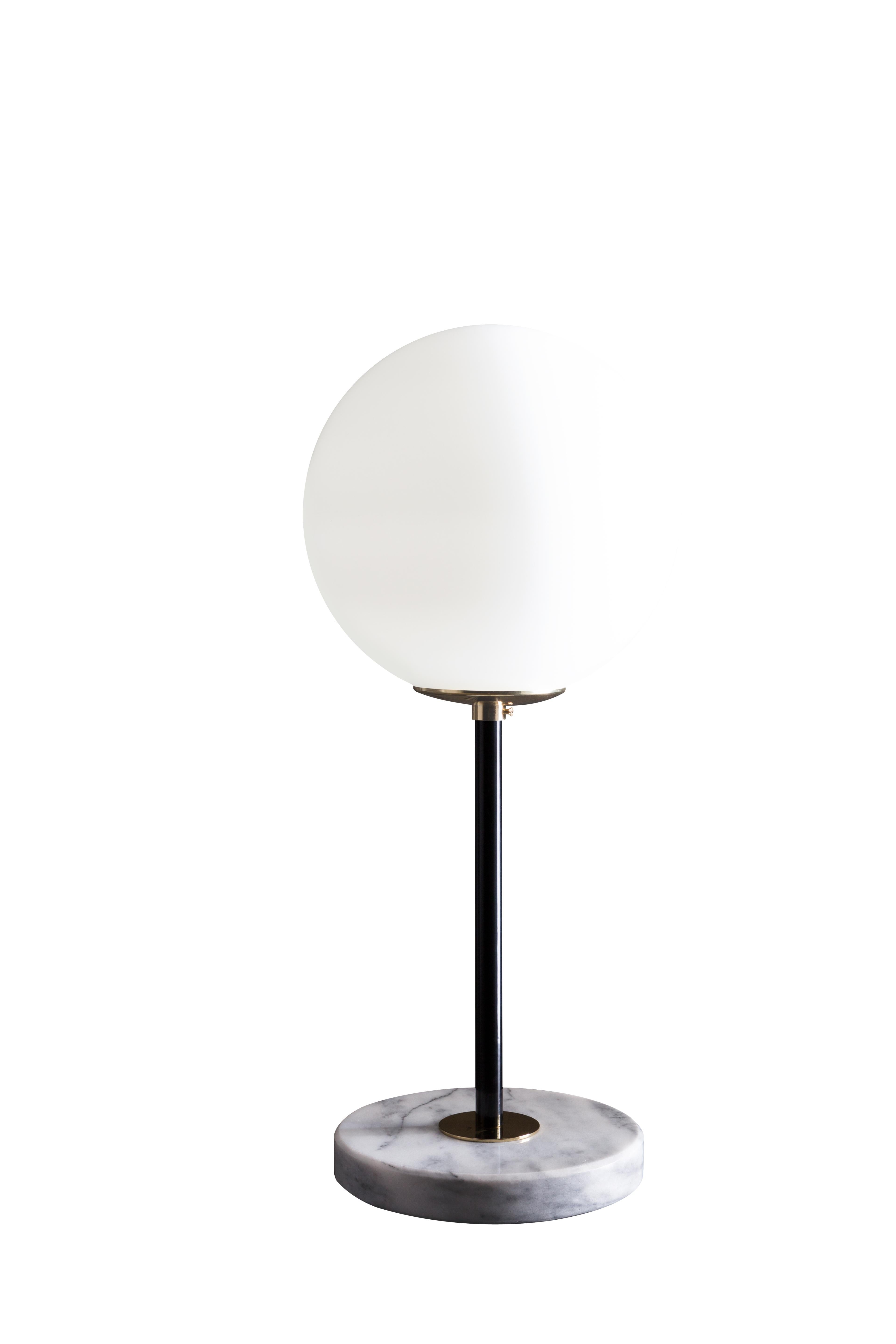 Black brass table lamp 06 by Magic Circus Editions
Dimensions: H 50 x W 22 cm
Materials: Smooth brass, mouth blown glass

Available Finishes: Brass, nickel
Available colors (central tube): Black, green pine, red wine, mustard yellow, and