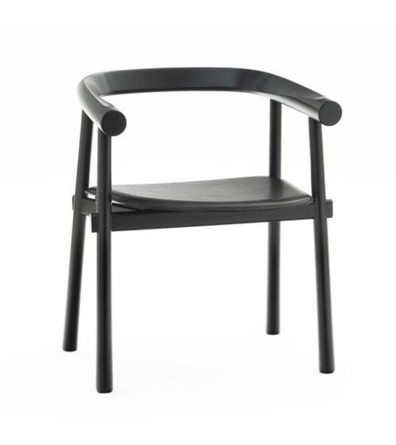 Black Bridge Altay armchair by Patricia Urquiola
Materials: Structure in natural solid beech varnished or black lacquered. Seat in full-grain black leather
Technique: Lacquered and black stained wood and natural leather. 
Dimensions: W 50 x D 60