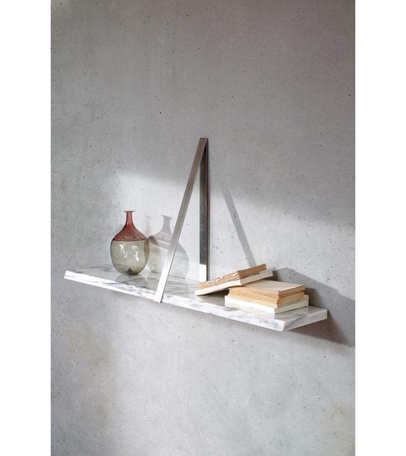 Marble T-square shelf by Michael Anastassiades
Materials: Top in natural Arabescato white marble. Triangular tray support in black nickel-plated bronze or polished solid brass.
Technique: Polished marble or polished brass. 
Dimensions: Top: L 100