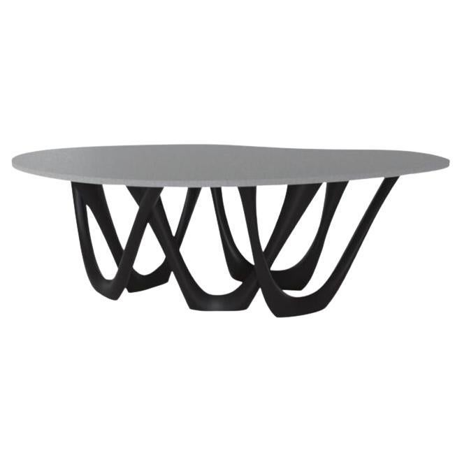 Skulpturaler G-Table aus schwarzem und braunem Betonstahl von Zieta