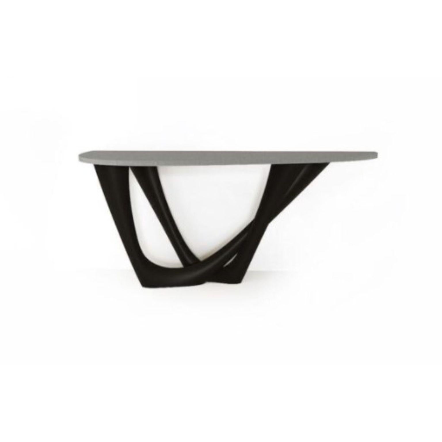 Black Brown G-console duo concrete top and steel base by Zieta
Dimensions: D 56 x W 168 x H 75 cm 
Material: Carbon steel, concrete.
Also available in different colors and dimensions.

G-Console is another bionic object in our collection. Created