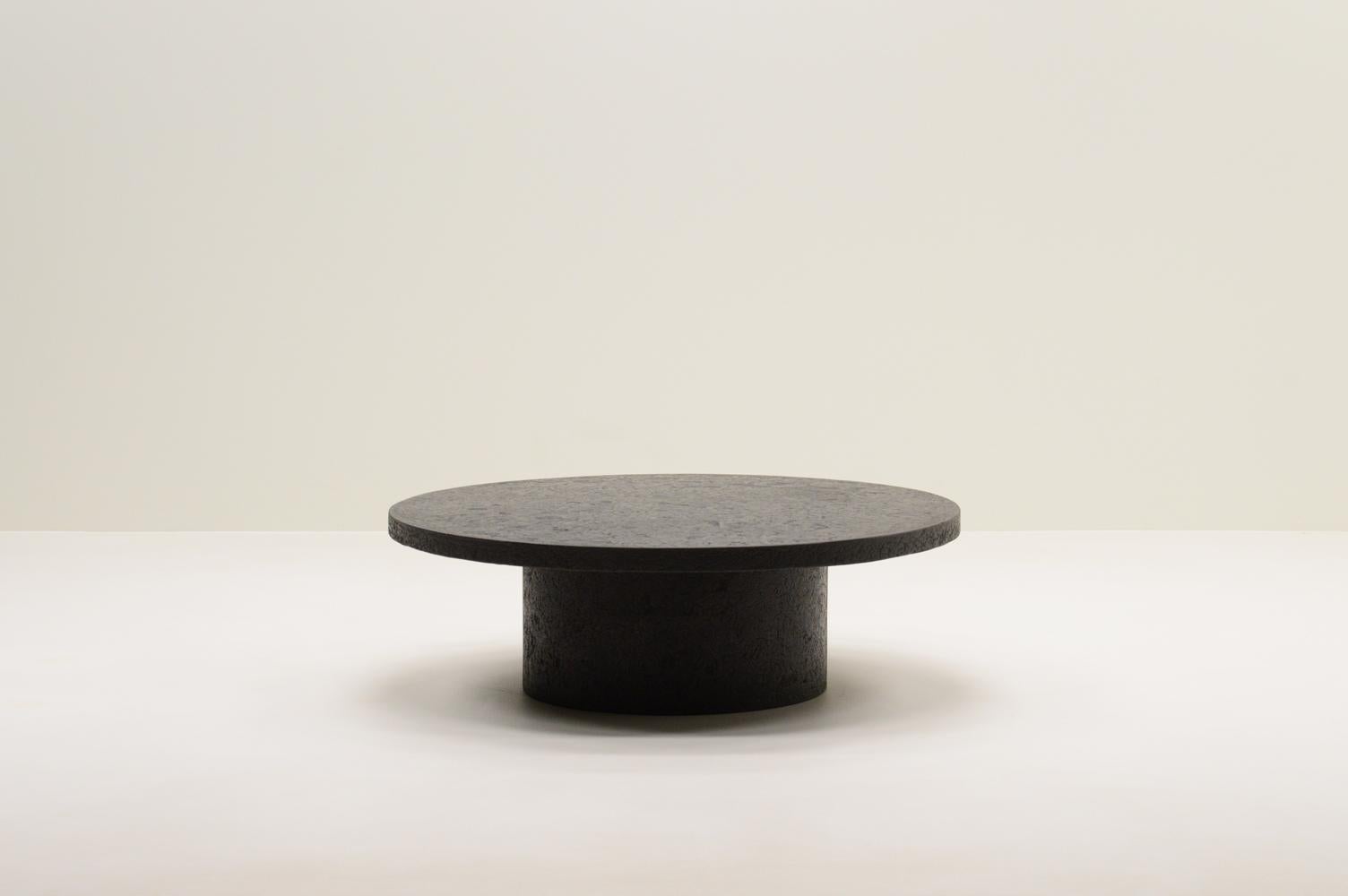 Black brutalist stone resin coffee table, 70’s The Netherlands. Impressive table made from a mixture of stone and resin, but looks completely stone. This gives a beautiful pattern and makes the table lighter. The base and top are in one piece. In