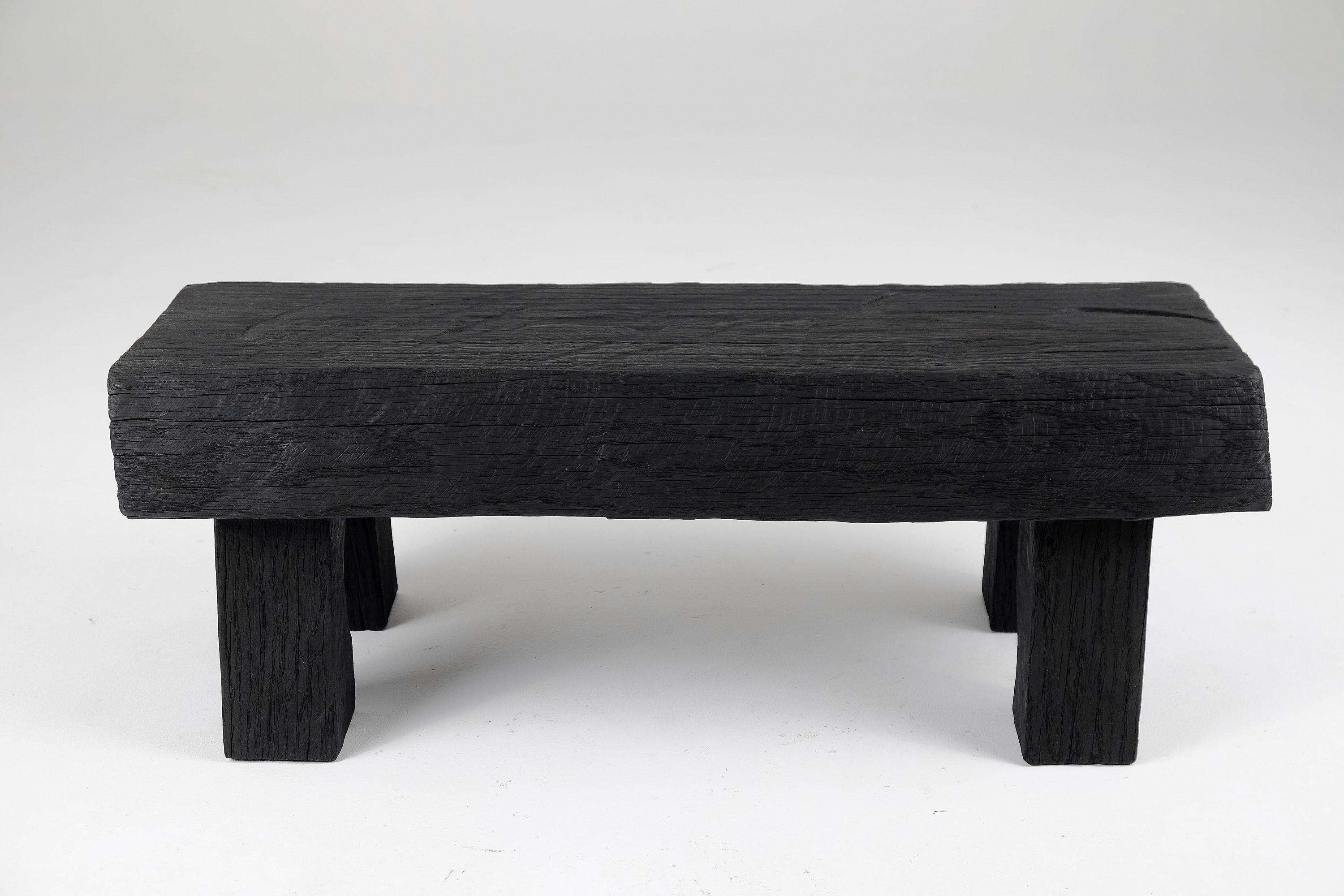 Unique bench/side table with original design by Logniture. Made entirely from wood. Protected with the highest quality oils, ensuring durability for generations. Such unique handmade design will highlight your interior and bring comfort to your