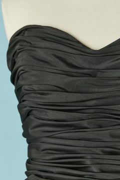 Black bustier cocktail dress draped on the bust CD de Christian Dior Circa 1980