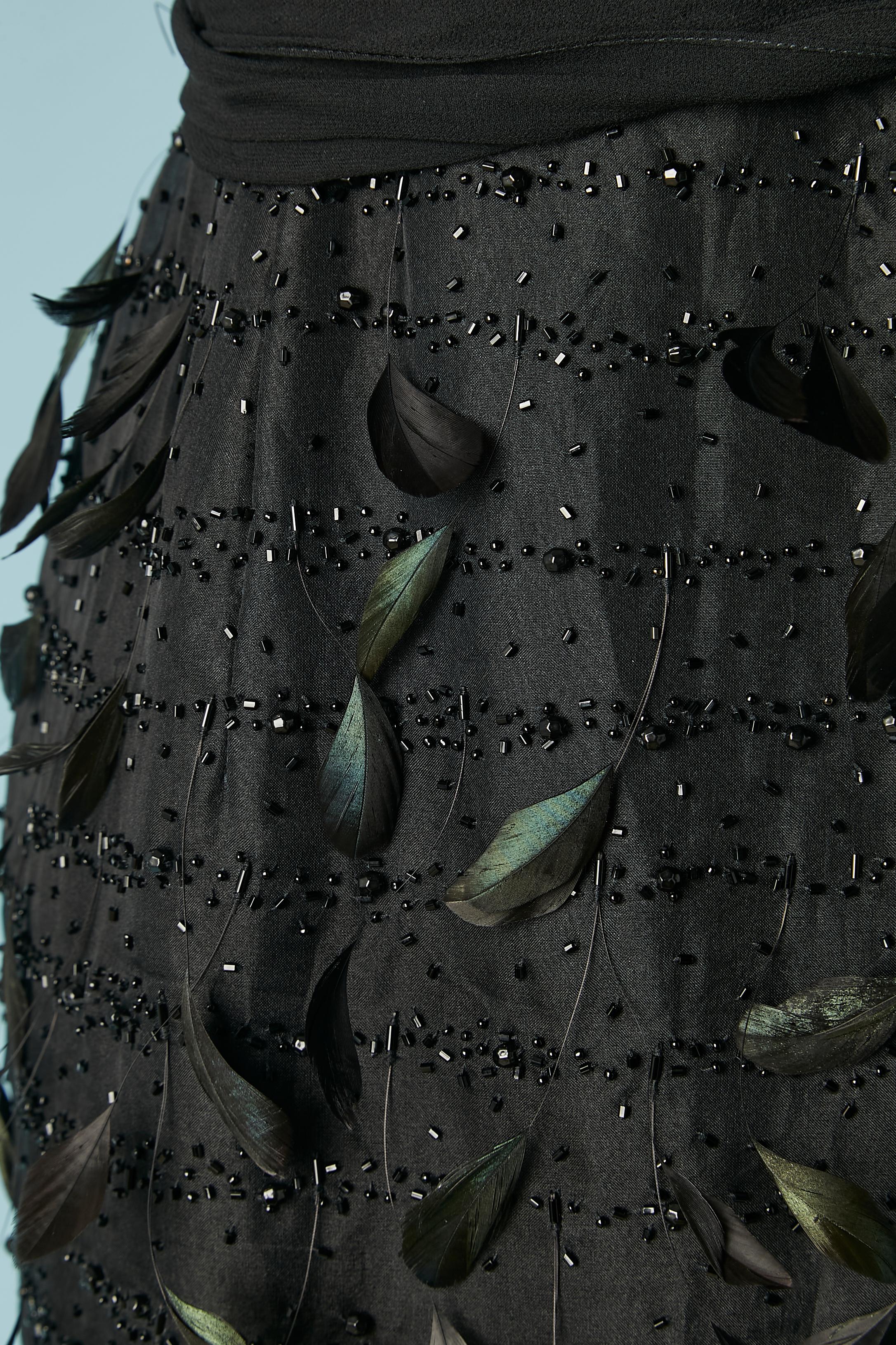 Black bustier cocktail dress with beads and feathers embellishment Circa 1960's In Excellent Condition For Sale In Saint-Ouen-Sur-Seine, FR