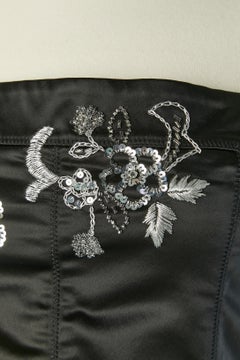 Black bustier dress with silver embroideries GALLIANO