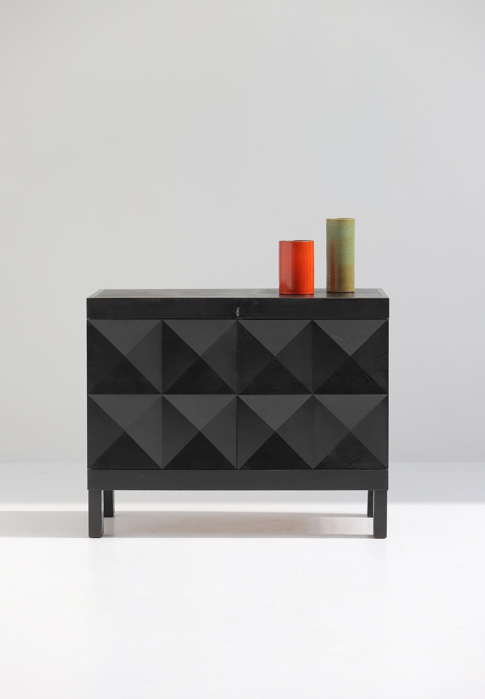 Mid-Century Modern Brutalist black cabinet with graphic patterned doors for MI, Belgium 1969 For Sale