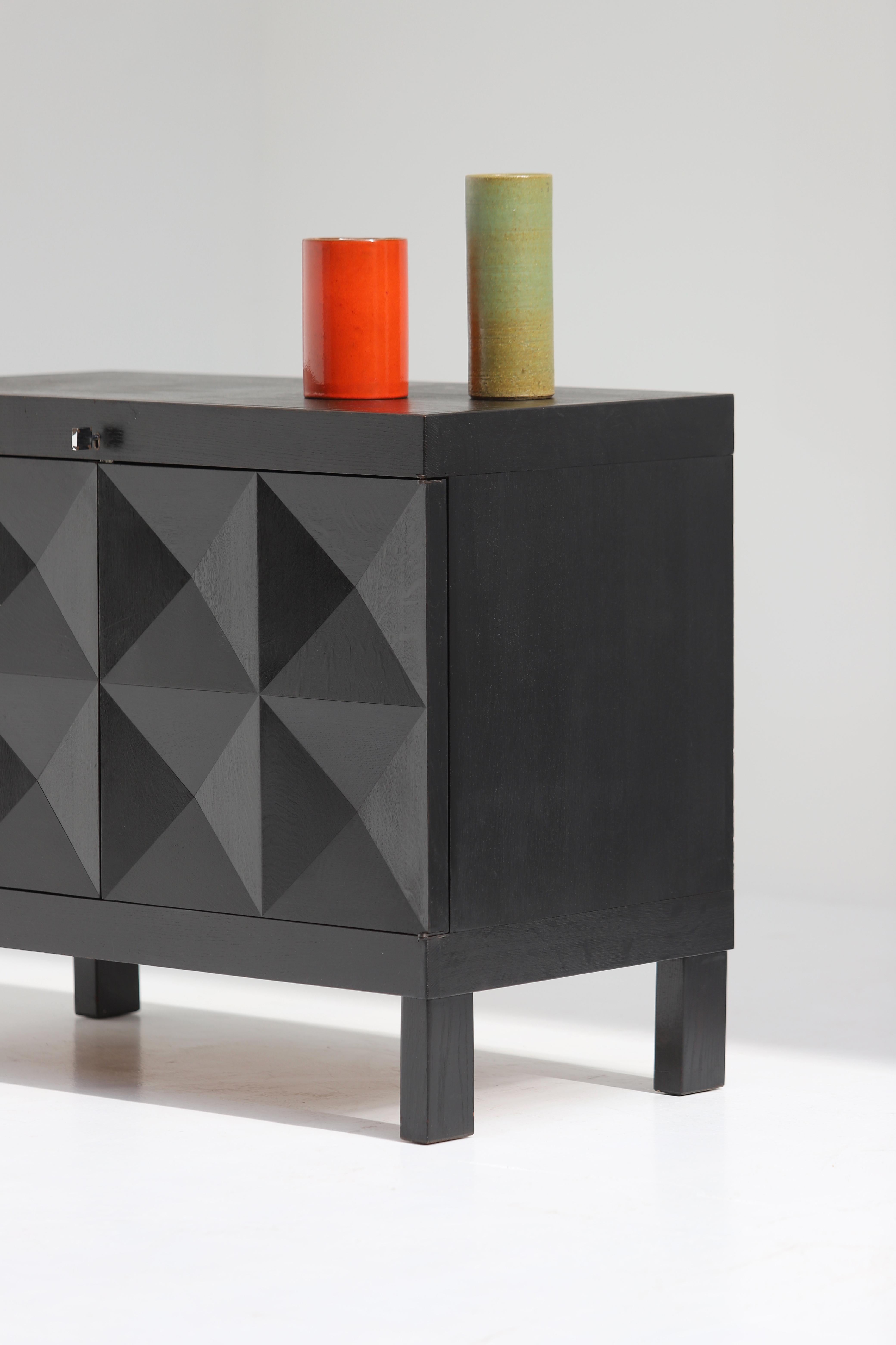 Late 20th Century Brutalist black cabinet with graphic patterned doors for MI, Belgium 1969 For Sale