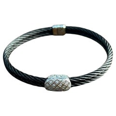 Bracciale nero a cavo con diamanti in oro bianco 18 carati con filigrana e dichiarazione a torsione