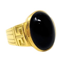 Vintage Black Cabochon Oval Onyx Ring in 18 Karat Yellow Gold Bold Wide Design