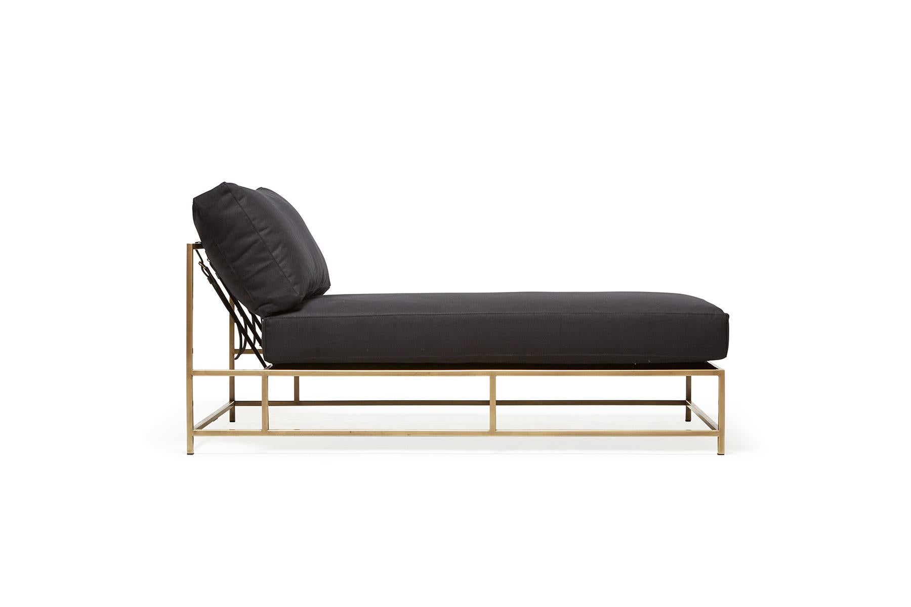 The Inheritance Chaise Lounge by Stephen Kenn is as comfortable as it is unique. The design features an exposed construction composed of three elements - a steel frame, plush upholstery, and supportive belts. The deep seating area is perfect for a