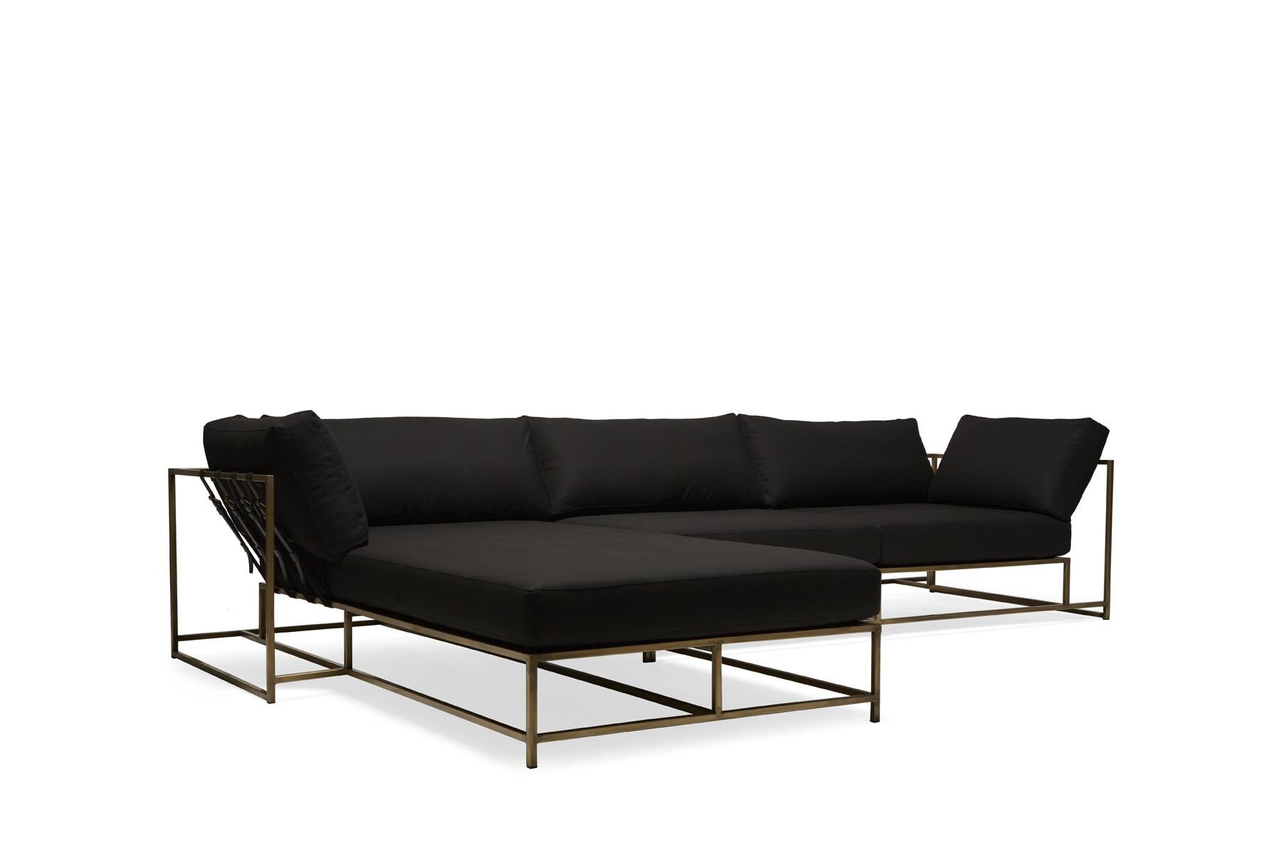 The inheritance sectional by Stephen Kenn is as comfortable as it is unique. The design features an exposed construction composed of three elements - a steel frame, plush upholstery, and supportive belts. The deep seating area is perfect for a