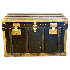 Black Canvas and Brass Flat Travel Trunk, Belle Époque France Circa 1912