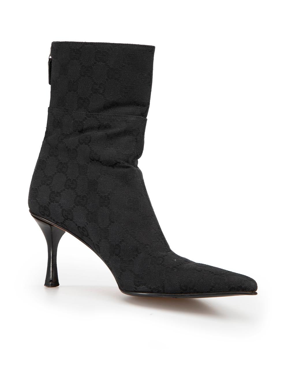 CONDITION is Very good. Minimal wear to boots is evident. Minimal wear to both heel-stems with scuffing on this used Gucci designer resale item. These boots come with original dust bag.



Details


Black

Canvas

Ankle boots

'GG' logo