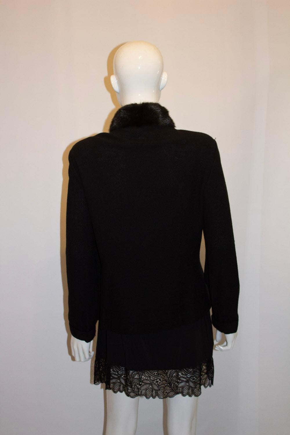 Nero Cardigan nero con splendida zip e collo di pelliccia in vendita