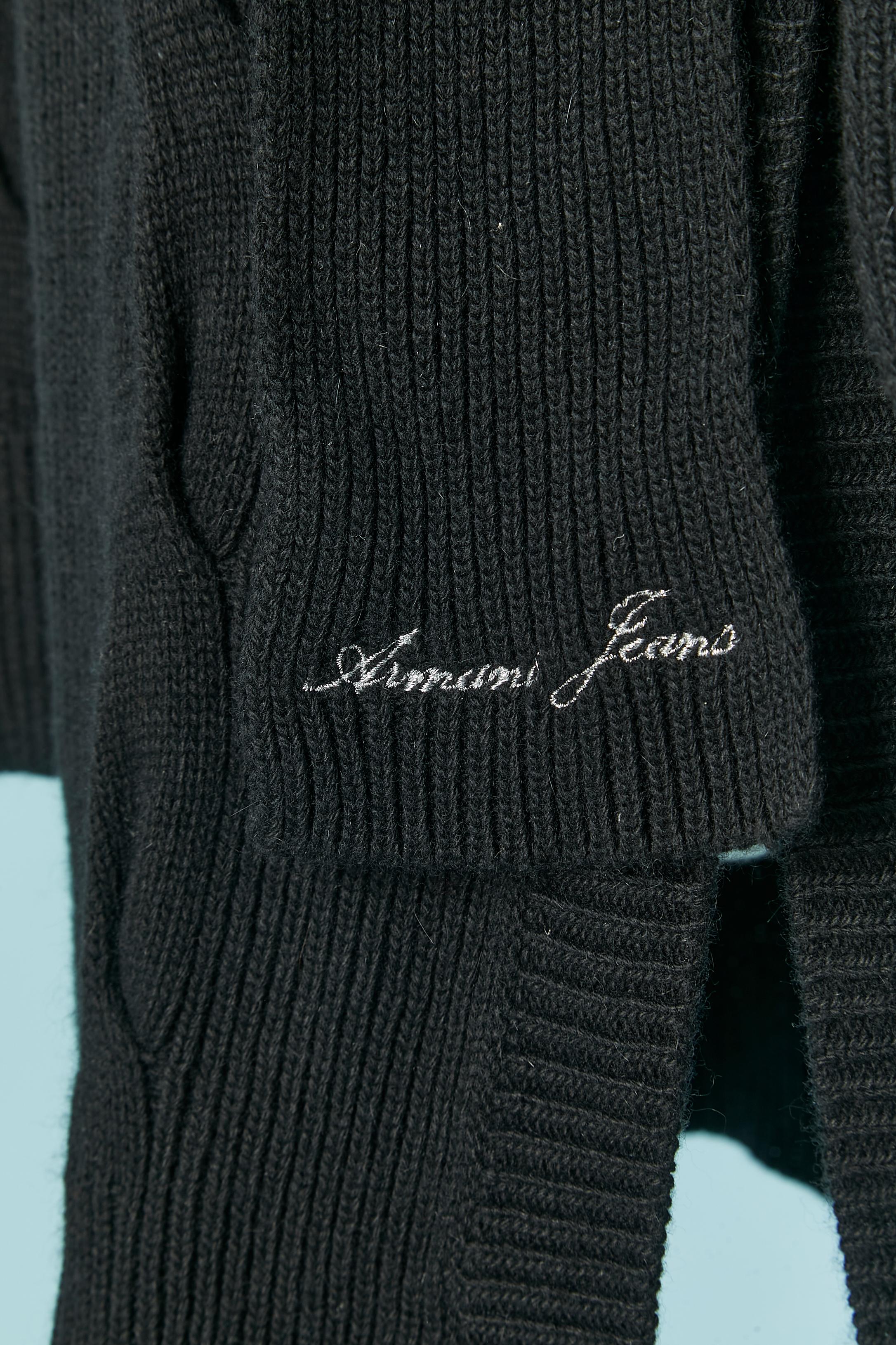 Black cardigan with belt and belt loop. 
 Knit composition: 40% rayon, 25% polyamide, 25% wool, 5% angora, 5% cashmere. New with tag
SIZE: 40 (It) S (US) 