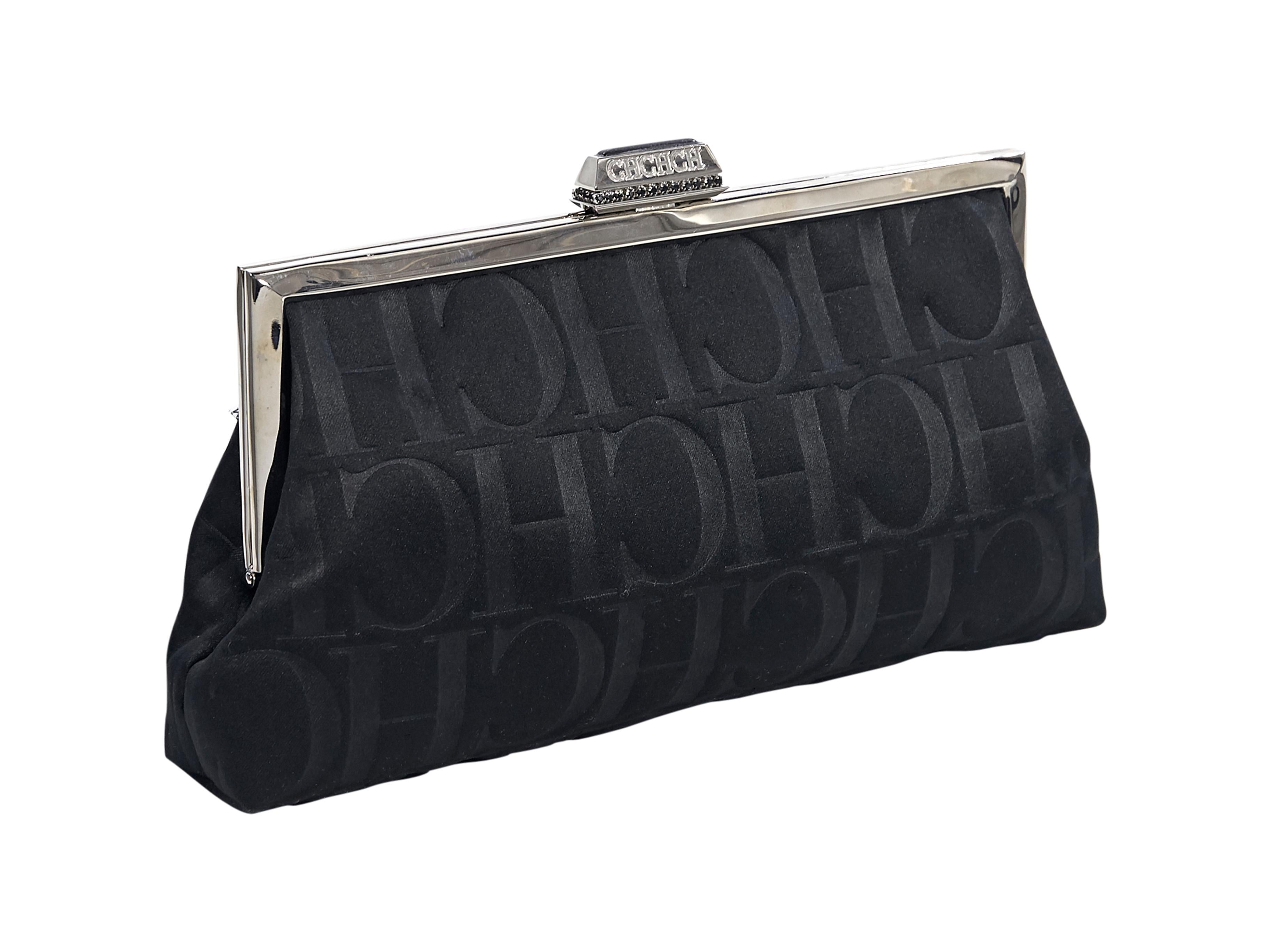 Product details:  Black silk logo clutch by Carolina Herrera.  Top crystal-encrusted push-lock closure.  Lined interior with inner slide pocket.  Silvertone hardware.  9