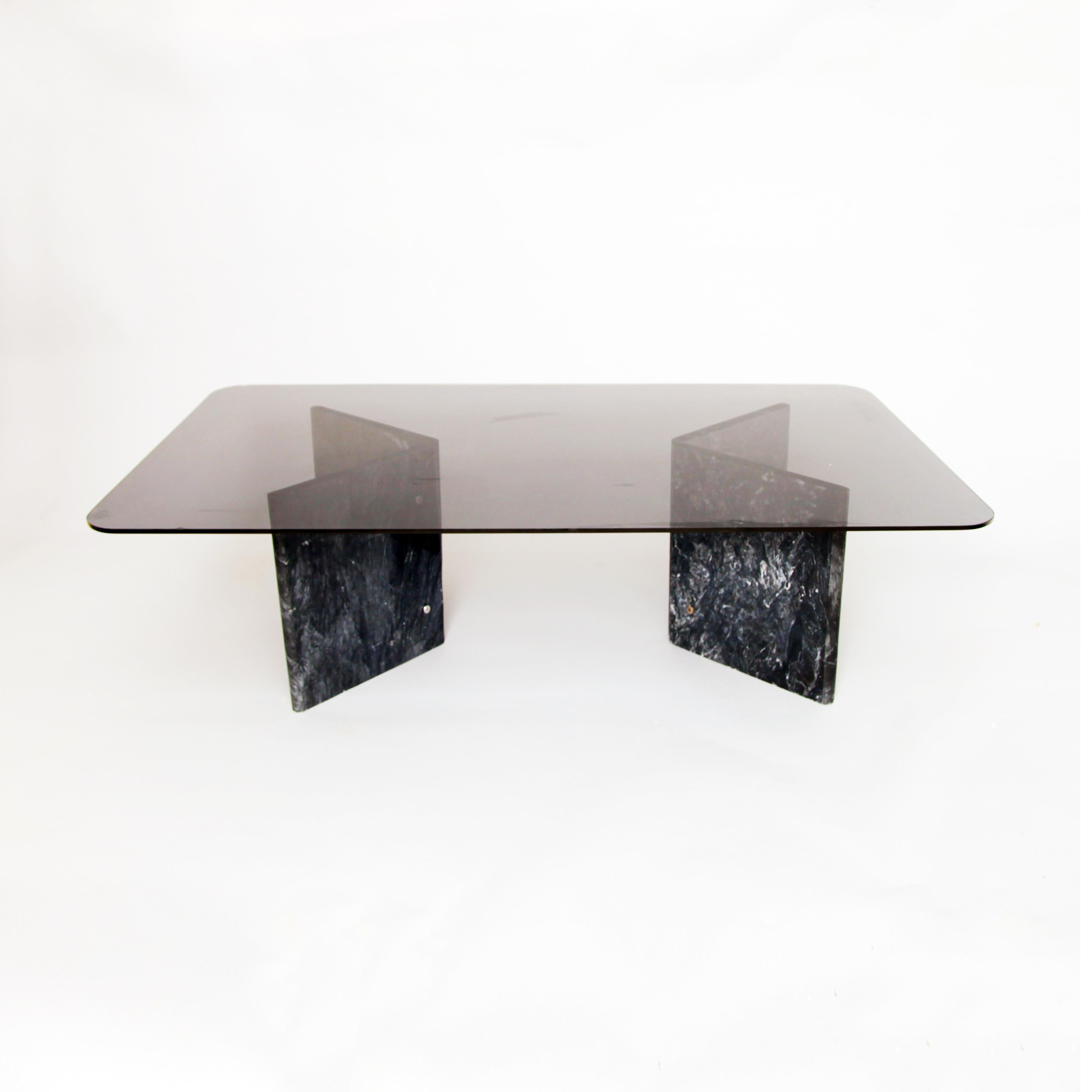 Beautiful and classic black Carrara marble coffee table with curved edges and big smoked glass top. The marble bases are joined with chrome fittings. 

Also available in smaller smoked glass top.