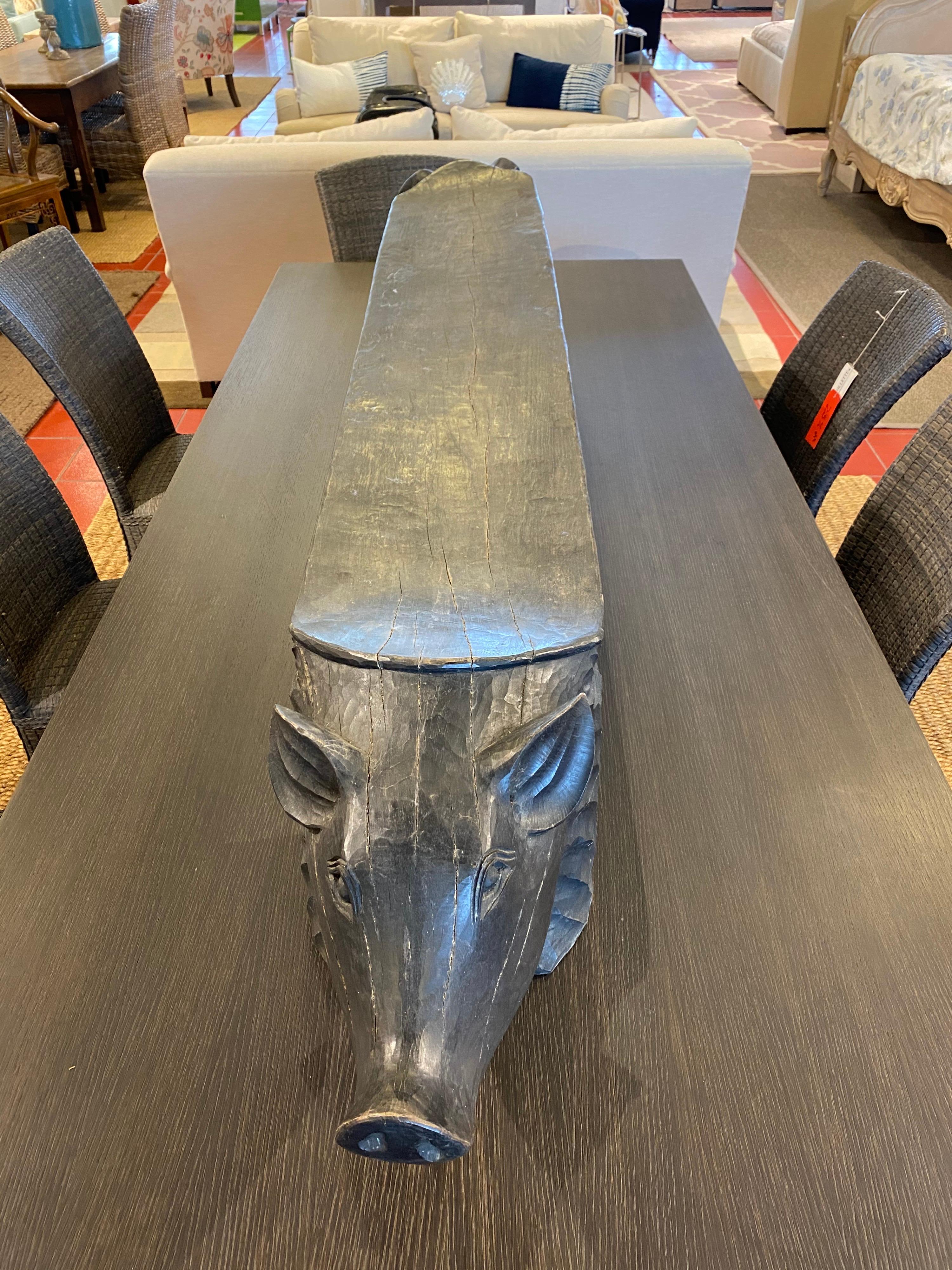 Black Carved Bench with Pig Heads In Good Condition In Bridgehampton, NY