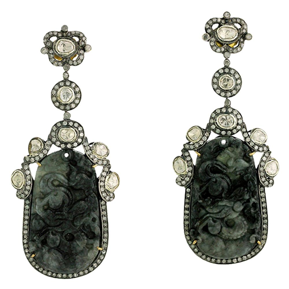 Boucles d'oreilles en jade noir sculpté et diamants