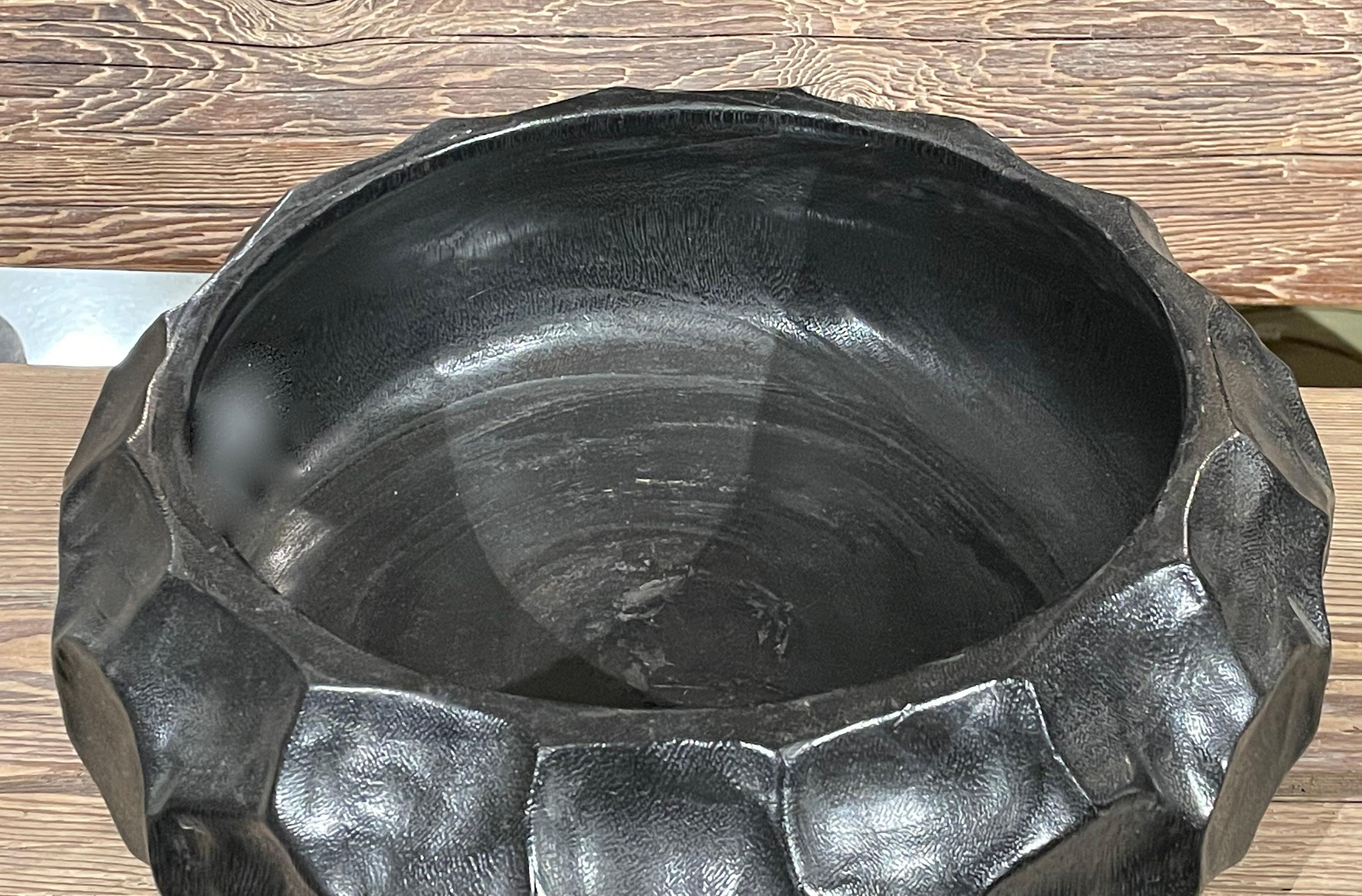 Contemporary Indonesian ebonized bowl carved from a palm tree.
Arriving TBD.