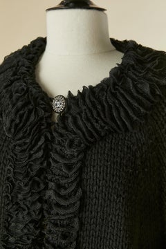 Black cashmere cardigan with ruffle edge CHANEL