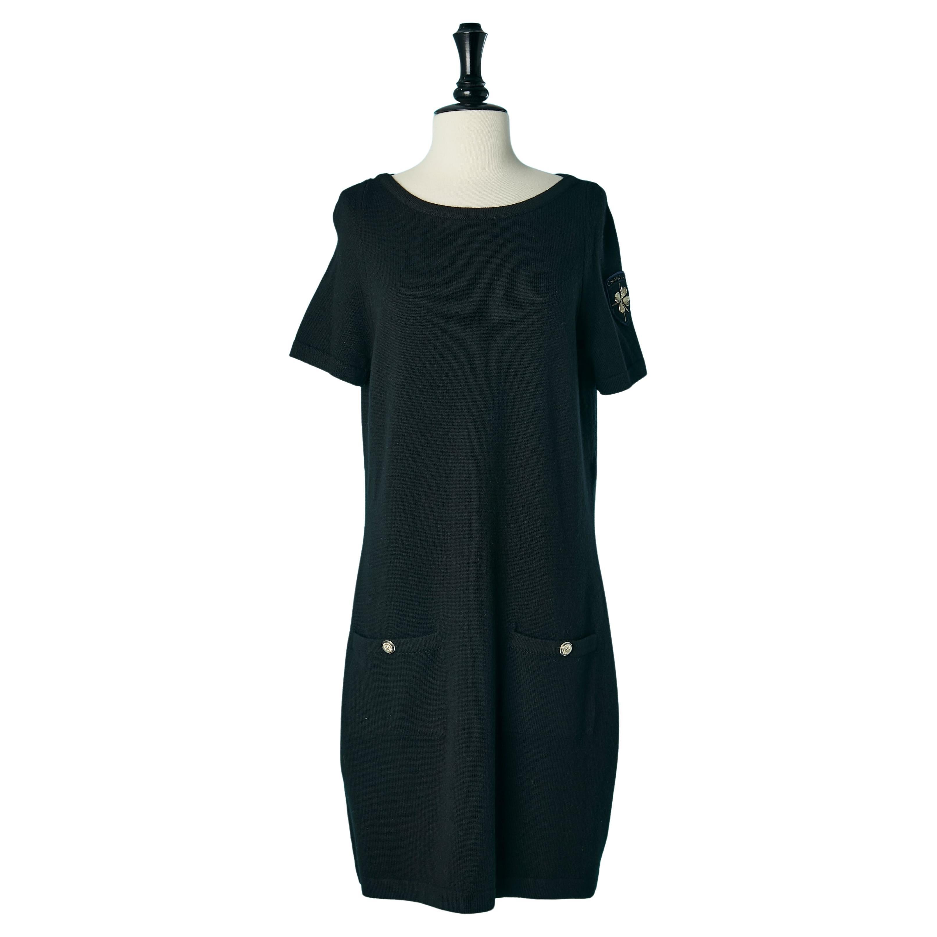 Black cashmere knit dress with short sleeves and clover brooches Chanel  For Sale
