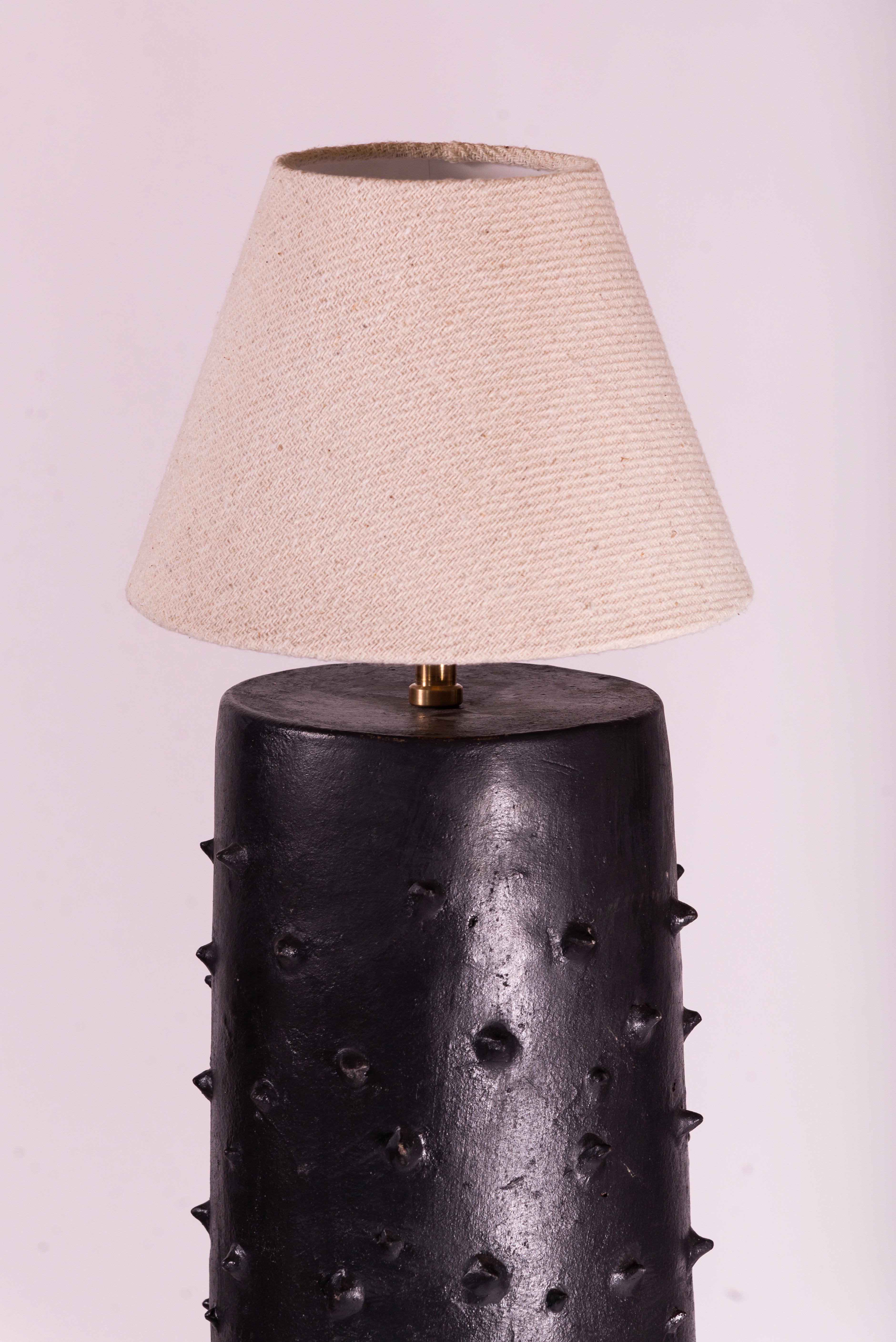 The Ceiba lamp is a clay lamp handmade by artisans from Yucatan and designed by Chuch Estudio. The large scale clay as an ancestral tradition allowed the production of these contemporary pieces. Oxides and natural minerals gave color to the piece. A