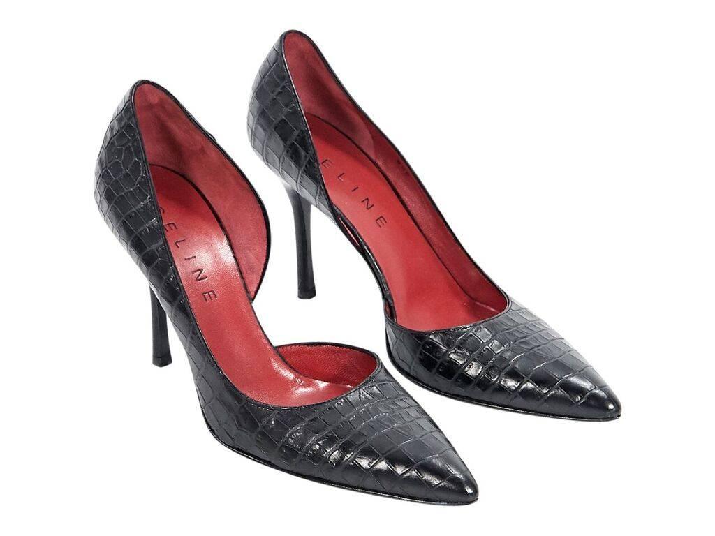 Product details:  Black embossed d'Orsay pumps by Celine.  Point toe.  Slip-on style.  Label size FR 38.5.  4