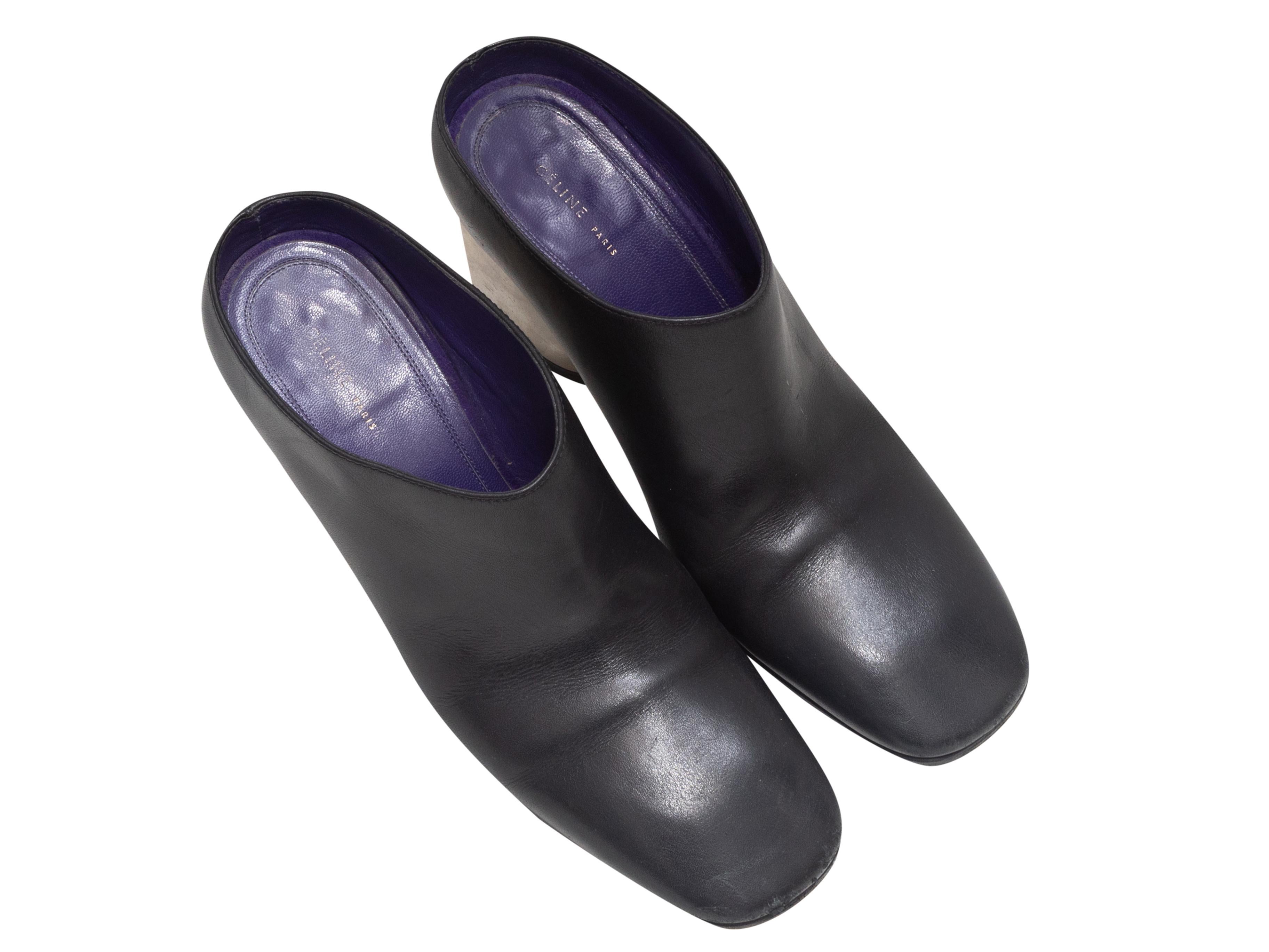 Mules de tacón de piel negra y metal plateado de Celine. Tacón en bloque. Altura del tacón de 2.75