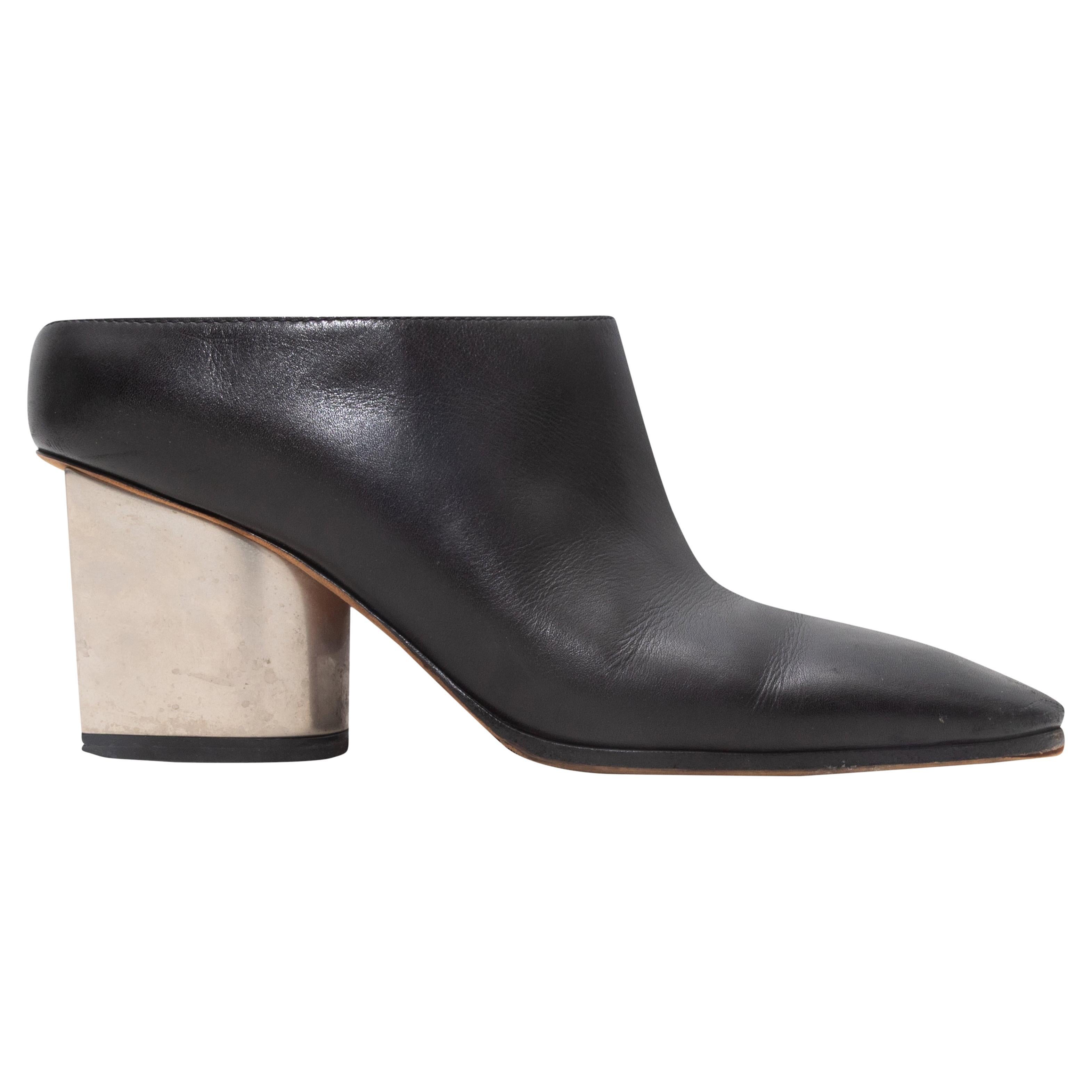 Mules à talons en cuir noir de Celine Taille 35.5