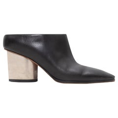 Mules à talons en cuir noir de Celine Taille 35.5