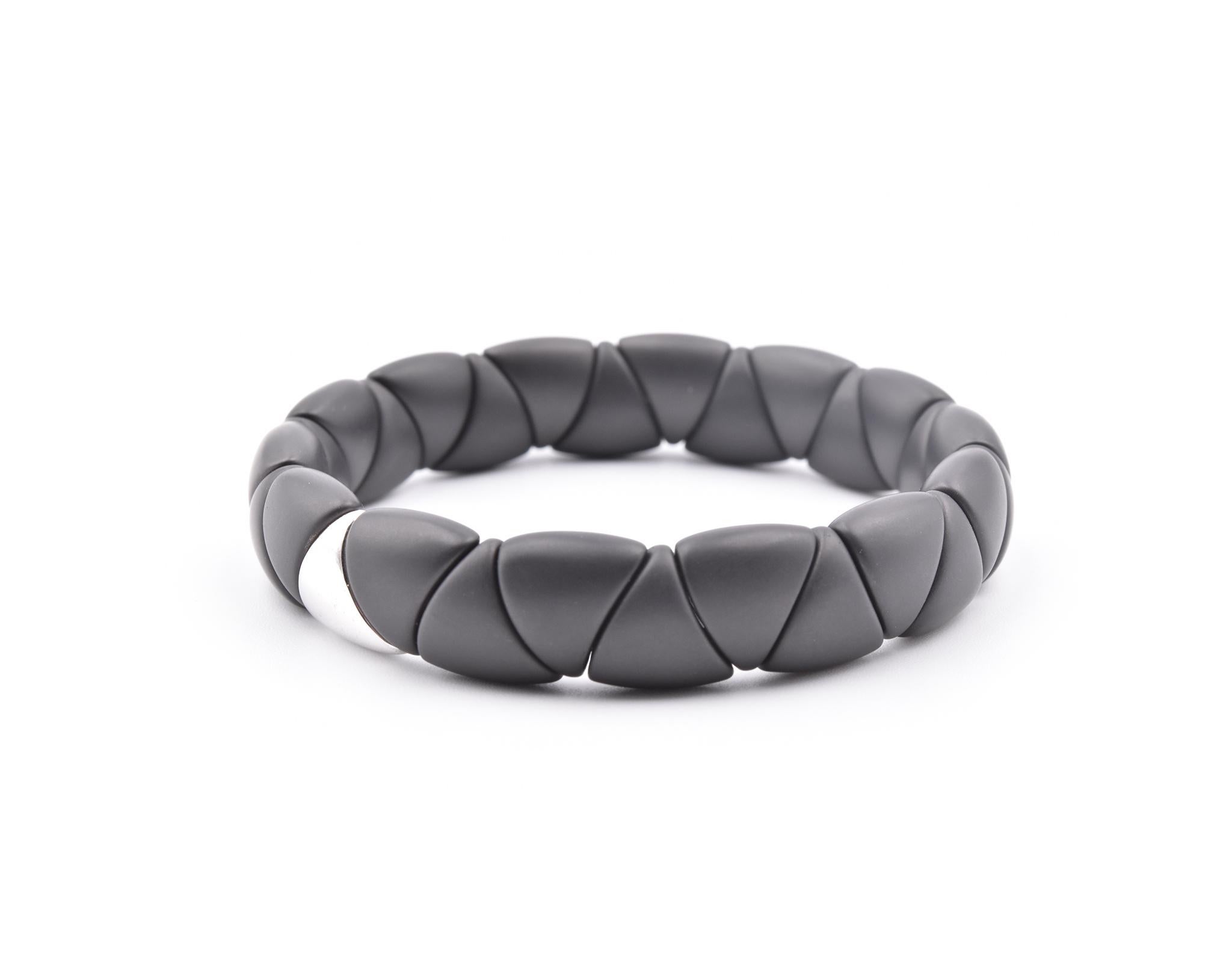 Designer: custom designed
Material: Black Ceramic and 18K White Gold
Dimensions: bracelet will fit a 6 ½-inch wrist and it is 6.65mm wide
Weight: 50.58
