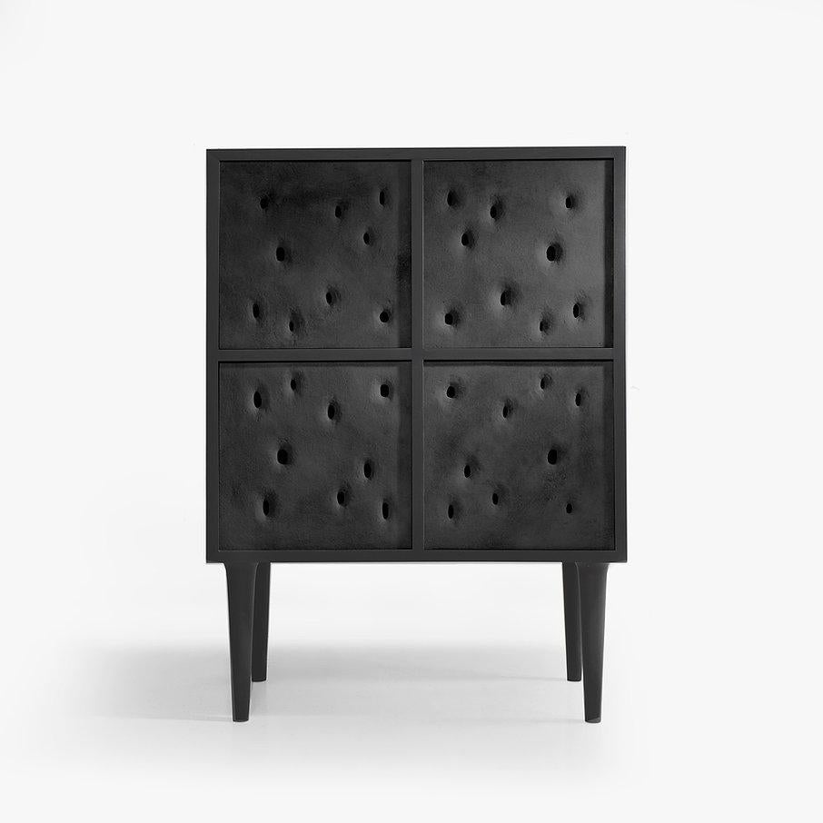 Black ceramic contemporary bar cabinet by Faina
Design: Victoriya Yakusha
Material: Clay, Ash
Dimensions: 76 x 44.3 x H 106 cm

Made in the style of ethnic minimalism, the collection items introduce “naive design”- simple in form, yet with a