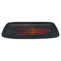 Black ceramic dish with fish decoration, by Oswald Tieberghien, circa 1970