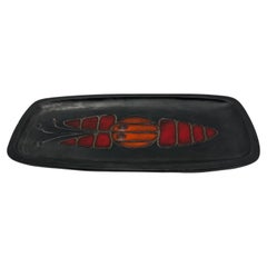 Black ceramic dish with fish decoration, by Oswald Tieberghien, circa 1970