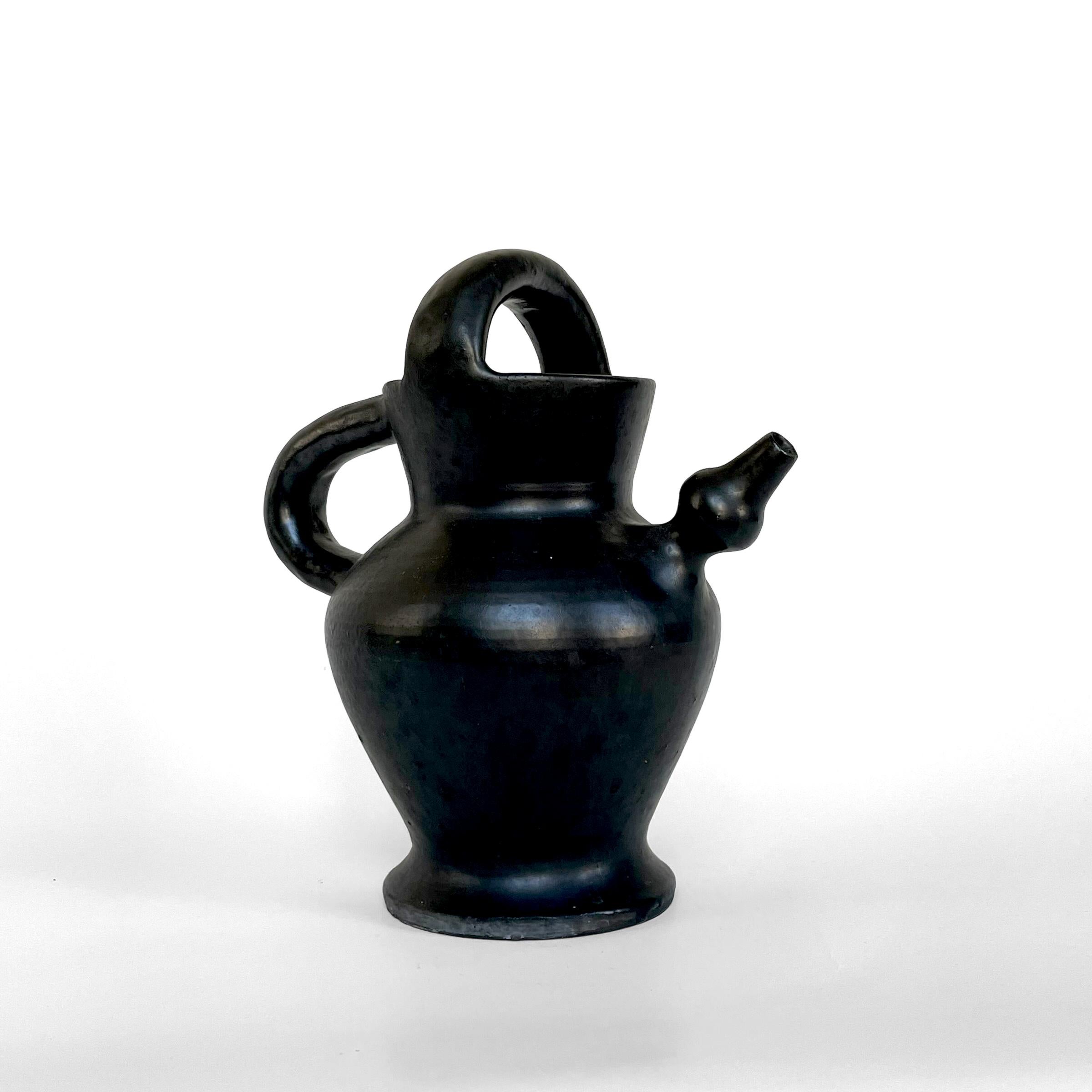 Large and rare black ceramic gargoulette by robert picault, ceramist of vallauris, circa 1955. 
Signature 